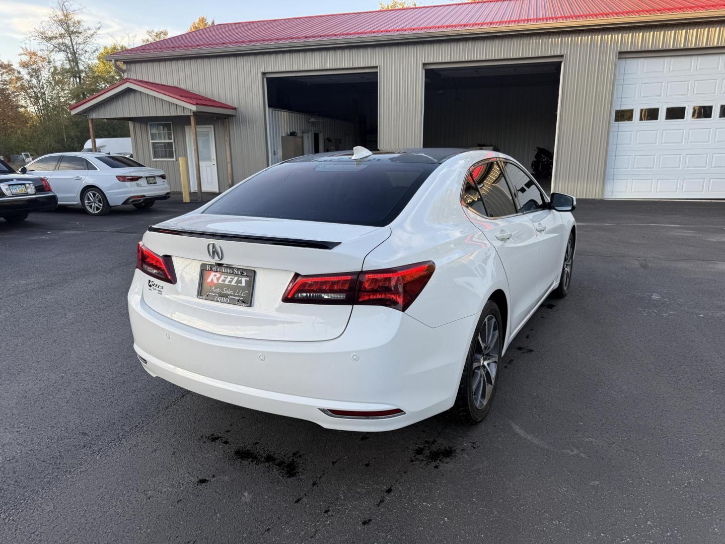 2016 White /Black Acura TLX 9-Spd AT SH-AWD w/Advance Package (19UUB3F78GA) with an 3.5L V6 SOHC 24V engine, 9A transmission, located at 547 E. Main St., Orwell, OH, 44076, (440) 437-5893, 41.535435, -80.847855 - Experience luxury and performance with this 2016 Acura TLX SH-AWD with Advance Package. Powered by a responsive 3.5L V6 engine and smooth 9-speed automatic transmission, this sedan delivers impressive acceleration—0 to 60 in just 5.7 seconds—while achieving up to 31 MPG on the highway. Enjoy a r - Photo#7