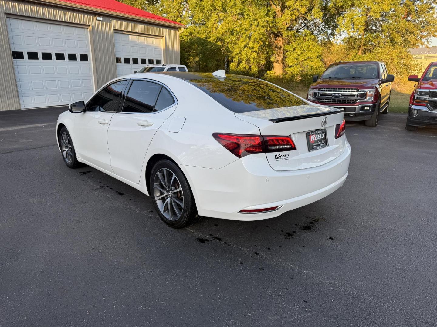 2016 White /Black Acura TLX 9-Spd AT SH-AWD w/Advance Package (19UUB3F78GA) with an 3.5L V6 SOHC 24V engine, 9A transmission, located at 547 E. Main St., Orwell, OH, 44076, (440) 437-5893, 41.535435, -80.847855 - Experience luxury and performance with this 2016 Acura TLX SH-AWD with Advance Package. Powered by a responsive 3.5L V6 engine and smooth 9-speed automatic transmission, this sedan delivers impressive acceleration—0 to 60 in just 5.7 seconds—while achieving up to 31 MPG on the highway. Enjoy a r - Photo#9