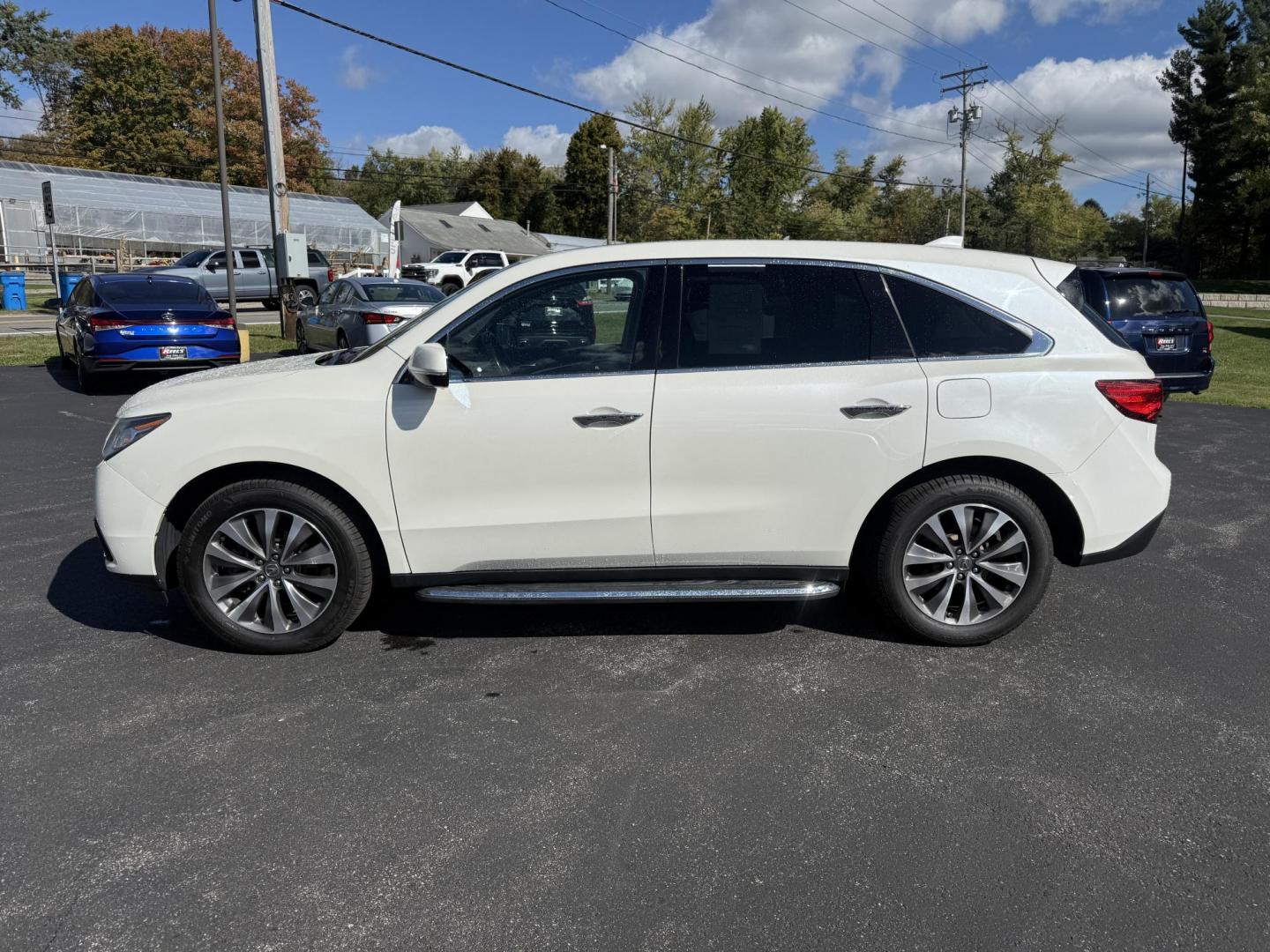2016 White /Gray Acura MDX SH-AWD 9-Spd AT w/Tech Package (5FRYD4H47GB) with an 3.5L V6 SOHC 24V engine, 9-Speed Automatic transmission, located at 11115 Chardon Rd. , Chardon, OH, 44024, (440) 214-9705, 41.580246, -81.241943 - Step into luxury and versatility with this 2016 Acura MDX equipped with the Technology Package. Powered by a refined 3.5L V6 engine and smooth 9-speed automatic transmission, this SUV offers a sophisticated leather interior with power front seats, heated front seats, and tri-zone automatic climate c - Photo#12