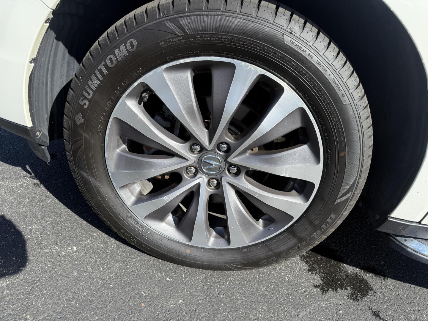2016 White /Gray Acura MDX SH-AWD 9-Spd AT w/Tech Package (5FRYD4H47GB) with an 3.5L V6 SOHC 24V engine, 9-Speed Automatic transmission, located at 11115 Chardon Rd. , Chardon, OH, 44024, (440) 214-9705, 41.580246, -81.241943 - Step into luxury and versatility with this 2016 Acura MDX equipped with the Technology Package. Powered by a refined 3.5L V6 engine and smooth 9-speed automatic transmission, this SUV offers a sophisticated leather interior with power front seats, heated front seats, and tri-zone automatic climate c - Photo#13