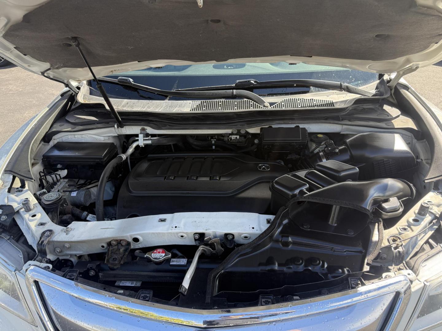 2016 White /Gray Acura MDX SH-AWD 9-Spd AT w/Tech Package (5FRYD4H47GB) with an 3.5L V6 SOHC 24V engine, 9-Speed Automatic transmission, located at 11115 Chardon Rd. , Chardon, OH, 44024, (440) 214-9705, 41.580246, -81.241943 - Step into luxury and versatility with this 2016 Acura MDX equipped with the Technology Package. Powered by a refined 3.5L V6 engine and smooth 9-speed automatic transmission, this SUV offers a sophisticated leather interior with power front seats, heated front seats, and tri-zone automatic climate c - Photo#14