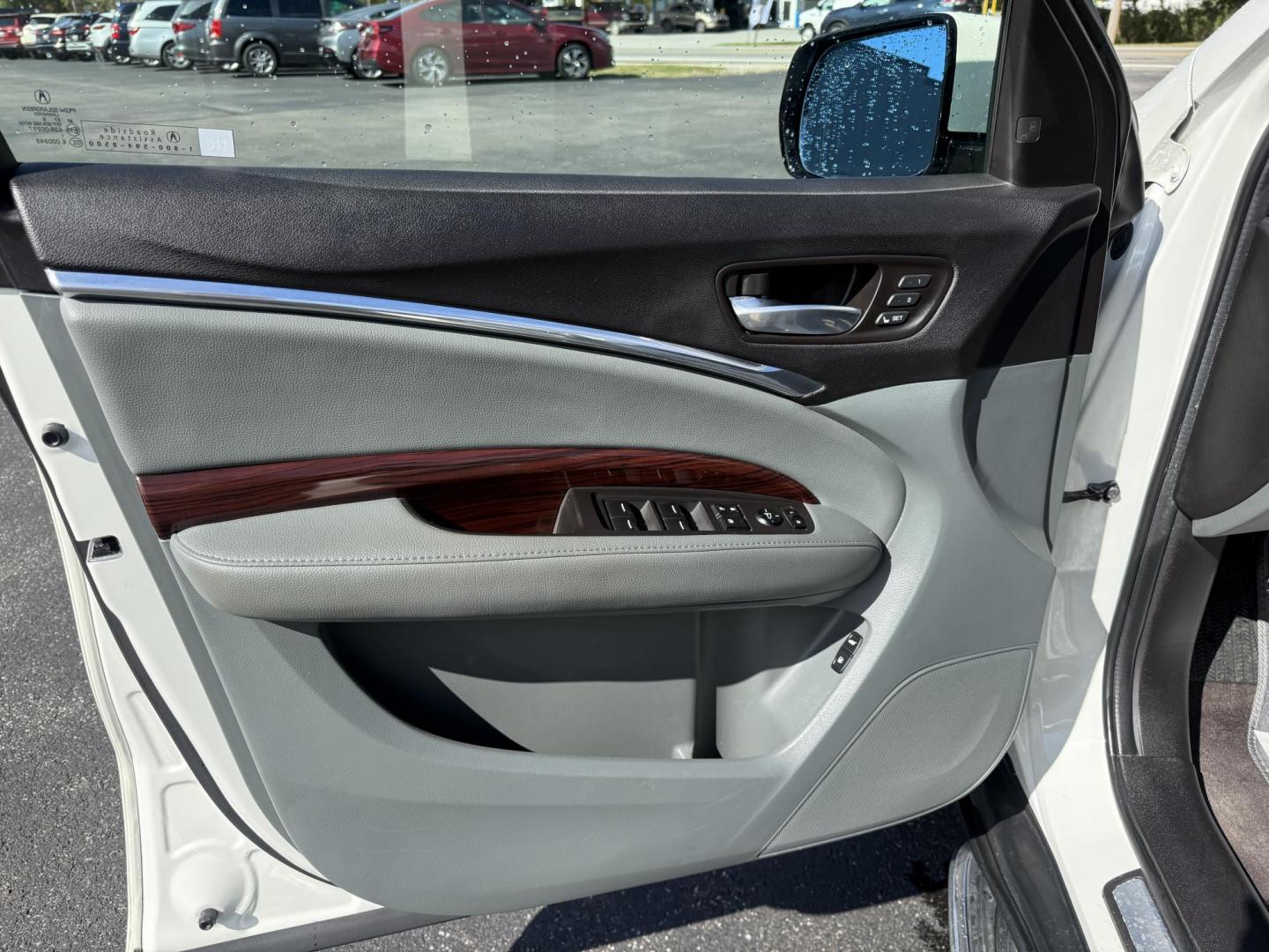 2016 White /Gray Acura MDX SH-AWD 9-Spd AT w/Tech Package (5FRYD4H47GB) with an 3.5L V6 SOHC 24V engine, 9-Speed Automatic transmission, located at 11115 Chardon Rd. , Chardon, OH, 44024, (440) 214-9705, 41.580246, -81.241943 - Step into luxury and versatility with this 2016 Acura MDX equipped with the Technology Package. Powered by a refined 3.5L V6 engine and smooth 9-speed automatic transmission, this SUV offers a sophisticated leather interior with power front seats, heated front seats, and tri-zone automatic climate c - Photo#16