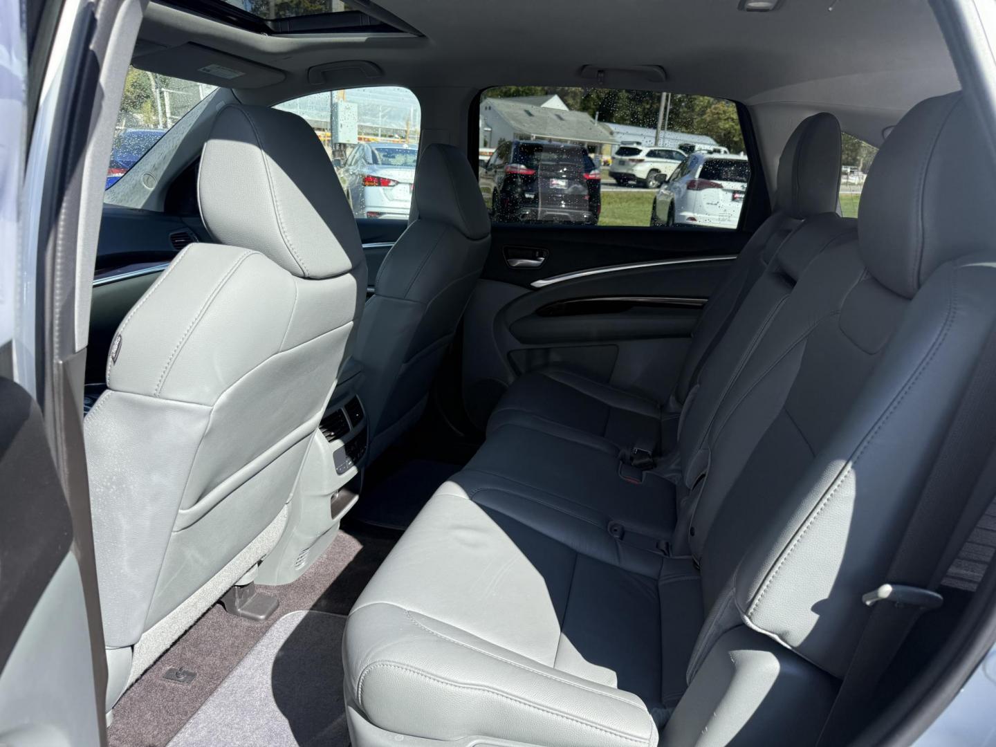 2016 White /Gray Acura MDX SH-AWD 9-Spd AT w/Tech Package (5FRYD4H47GB) with an 3.5L V6 SOHC 24V engine, 9-Speed Automatic transmission, located at 11115 Chardon Rd. , Chardon, OH, 44024, (440) 214-9705, 41.580246, -81.241943 - Step into luxury and versatility with this 2016 Acura MDX equipped with the Technology Package. Powered by a refined 3.5L V6 engine and smooth 9-speed automatic transmission, this SUV offers a sophisticated leather interior with power front seats, heated front seats, and tri-zone automatic climate c - Photo#38