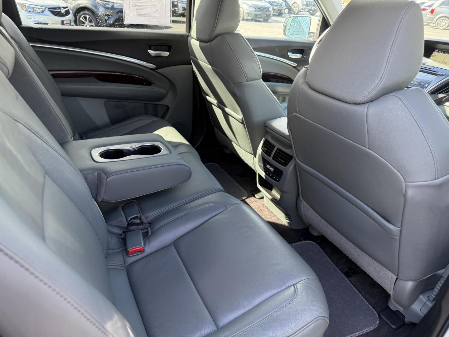 2016 White /Gray Acura MDX SH-AWD 9-Spd AT w/Tech Package (5FRYD4H47GB) with an 3.5L V6 SOHC 24V engine, 9-Speed Automatic transmission, located at 11115 Chardon Rd. , Chardon, OH, 44024, (440) 214-9705, 41.580246, -81.241943 - Step into luxury and versatility with this 2016 Acura MDX equipped with the Technology Package. Powered by a refined 3.5L V6 engine and smooth 9-speed automatic transmission, this SUV offers a sophisticated leather interior with power front seats, heated front seats, and tri-zone automatic climate c - Photo#44