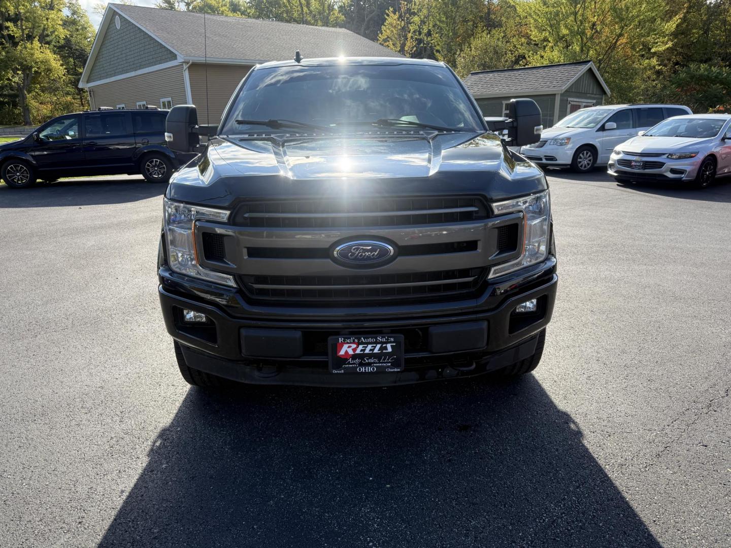 2018 Black /Black Ford F-150 XLT SuperCrew 6.5-ft. Bed 4WD (1FTFW1E58JK) with an 5.0L V8 OHV 16V engine, 10 Speed Auto transmission, located at 11115 Chardon Rd. , Chardon, OH, 44024, (440) 214-9705, 41.580246, -81.241943 - Take on any job or adventure with this 2018 Ford F-150 XLT 4WD Crew Cab, featuring a powerful 5.0L Coyote V8 engine and 10-speed automatic transmission. Equipped with the FX4 Off-Road Package, 3.73 gearing, locking rear differential, and a 36-gallon extended range fuel tank, this truck is built for - Photo#1