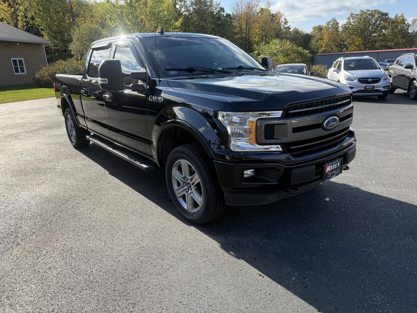 2018 Black /Black Ford F-150 XLT SuperCrew 6.5-ft. Bed 4WD (1FTFW1E58JK) with an 5.0L V8 OHV 16V engine, 10 Speed Auto transmission, located at 11115 Chardon Rd. , Chardon, OH, 44024, (440) 214-9705, 41.580246, -81.241943 - Take on any job or adventure with this 2018 Ford F-150 XLT 4WD Crew Cab, featuring a powerful 5.0L Coyote V8 engine and 10-speed automatic transmission. Equipped with the FX4 Off-Road Package, 3.73 gearing, locking rear differential, and a 36-gallon extended range fuel tank, this truck is built for - Photo#2