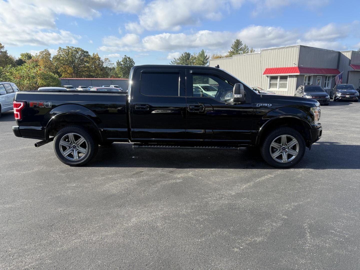 2018 Black /Black Ford F-150 XLT SuperCrew 6.5-ft. Bed 4WD (1FTFW1E58JK) with an 5.0L V8 OHV 16V engine, 10 Speed Auto transmission, located at 11115 Chardon Rd. , Chardon, OH, 44024, (440) 214-9705, 41.580246, -81.241943 - Take on any job or adventure with this 2018 Ford F-150 XLT 4WD Crew Cab, featuring a powerful 5.0L Coyote V8 engine and 10-speed automatic transmission. Equipped with the FX4 Off-Road Package, 3.73 gearing, locking rear differential, and a 36-gallon extended range fuel tank, this truck is built for - Photo#6