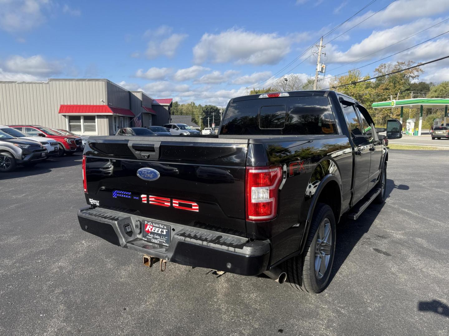 2018 Black /Black Ford F-150 XLT SuperCrew 6.5-ft. Bed 4WD (1FTFW1E58JK) with an 5.0L V8 OHV 16V engine, 10 Speed Auto transmission, located at 11115 Chardon Rd. , Chardon, OH, 44024, (440) 214-9705, 41.580246, -81.241943 - Take on any job or adventure with this 2018 Ford F-150 XLT 4WD Crew Cab, featuring a powerful 5.0L Coyote V8 engine and 10-speed automatic transmission. Equipped with the FX4 Off-Road Package, 3.73 gearing, locking rear differential, and a 36-gallon extended range fuel tank, this truck is built for - Photo#8