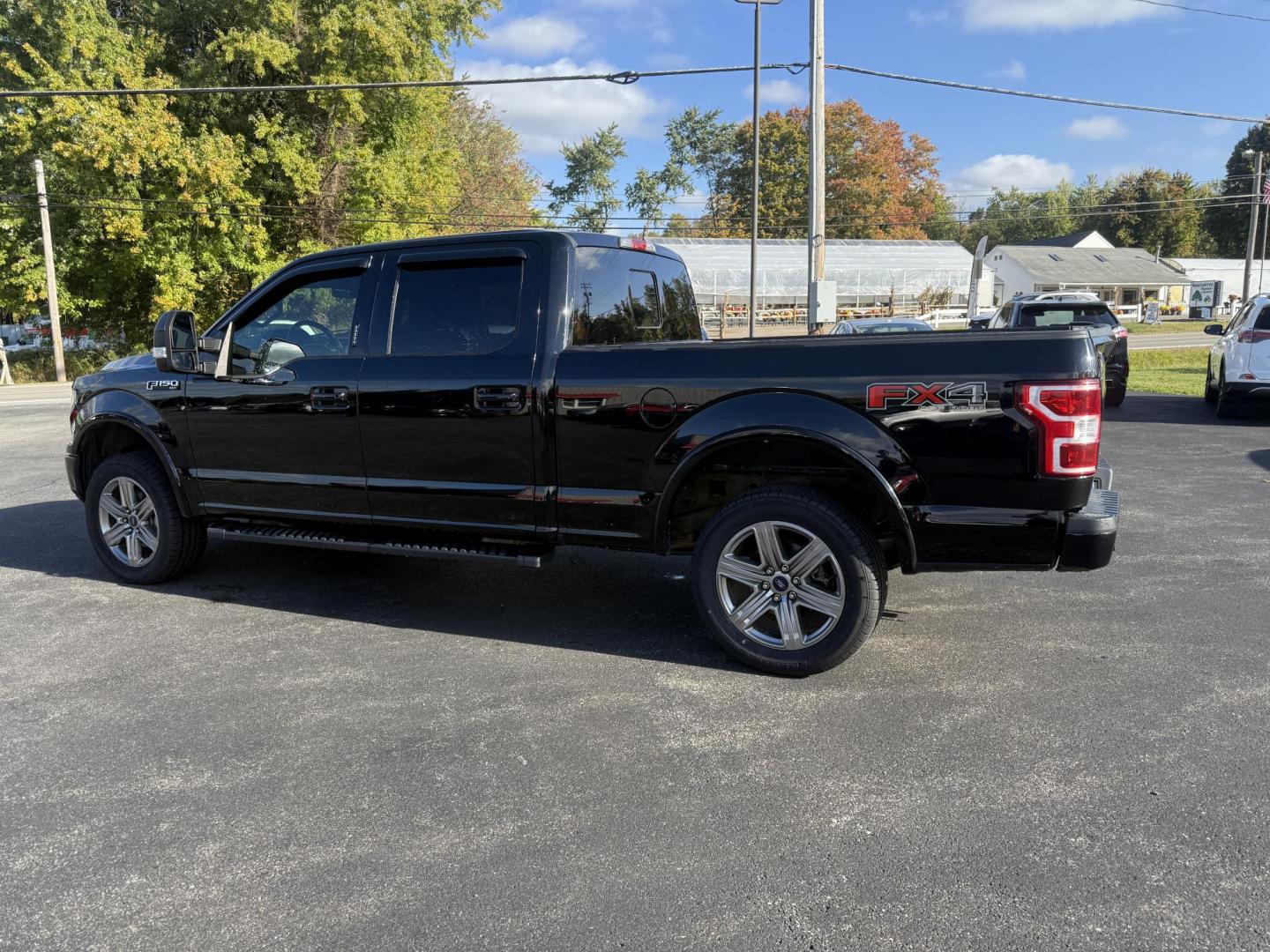 2018 Black /Black Ford F-150 XLT SuperCrew 6.5-ft. Bed 4WD (1FTFW1E58JK) with an 5.0L V8 OHV 16V engine, 10 Speed Auto transmission, located at 11115 Chardon Rd. , Chardon, OH, 44024, (440) 214-9705, 41.580246, -81.241943 - Take on any job or adventure with this 2018 Ford F-150 XLT 4WD Crew Cab, featuring a powerful 5.0L Coyote V8 engine and 10-speed automatic transmission. Equipped with the FX4 Off-Road Package, 3.73 gearing, locking rear differential, and a 36-gallon extended range fuel tank, this truck is built for - Photo#11