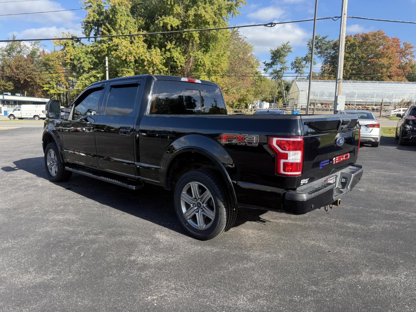 2018 Black /Black Ford F-150 XLT SuperCrew 6.5-ft. Bed 4WD (1FTFW1E58JK) with an 5.0L V8 OHV 16V engine, 10 Speed Auto transmission, located at 11115 Chardon Rd. , Chardon, OH, 44024, (440) 214-9705, 41.580246, -81.241943 - Take on any job or adventure with this 2018 Ford F-150 XLT 4WD Crew Cab, featuring a powerful 5.0L Coyote V8 engine and 10-speed automatic transmission. Equipped with the FX4 Off-Road Package, 3.73 gearing, locking rear differential, and a 36-gallon extended range fuel tank, this truck is built for - Photo#10