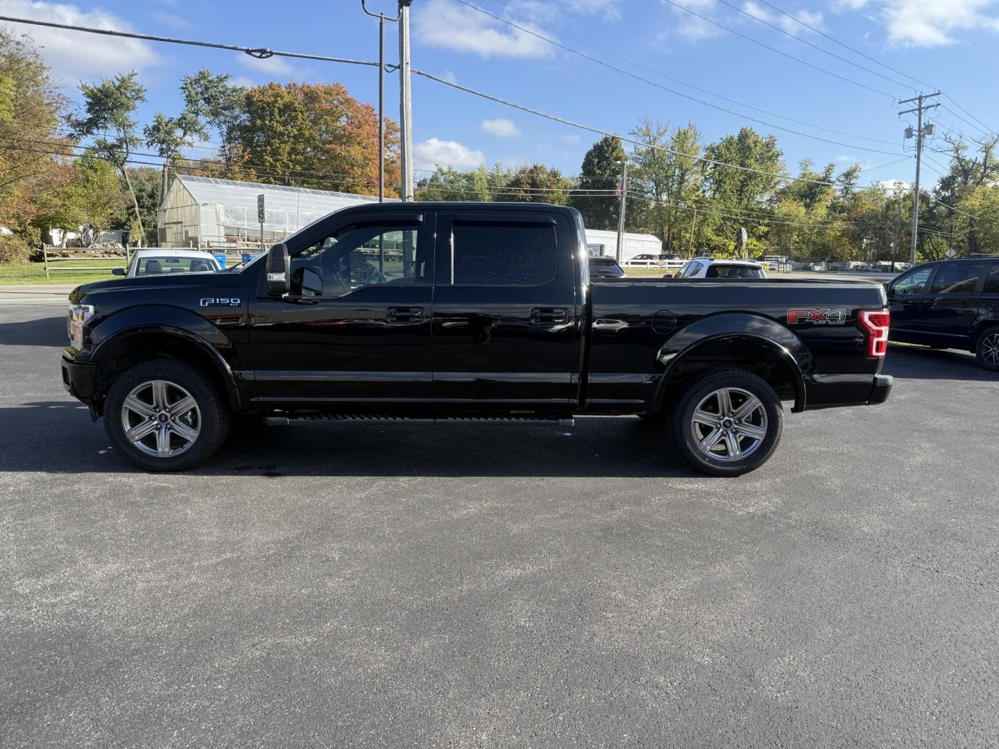 2018 Black /Black Ford F-150 XLT SuperCrew 6.5-ft. Bed 4WD (1FTFW1E58JK) with an 5.0L V8 OHV 16V engine, 10 Speed Auto transmission, located at 11115 Chardon Rd. , Chardon, OH, 44024, (440) 214-9705, 41.580246, -81.241943 - Take on any job or adventure with this 2018 Ford F-150 XLT 4WD Crew Cab, featuring a powerful 5.0L Coyote V8 engine and 10-speed automatic transmission. Equipped with the FX4 Off-Road Package, 3.73 gearing, locking rear differential, and a 36-gallon extended range fuel tank, this truck is built for - Photo#13