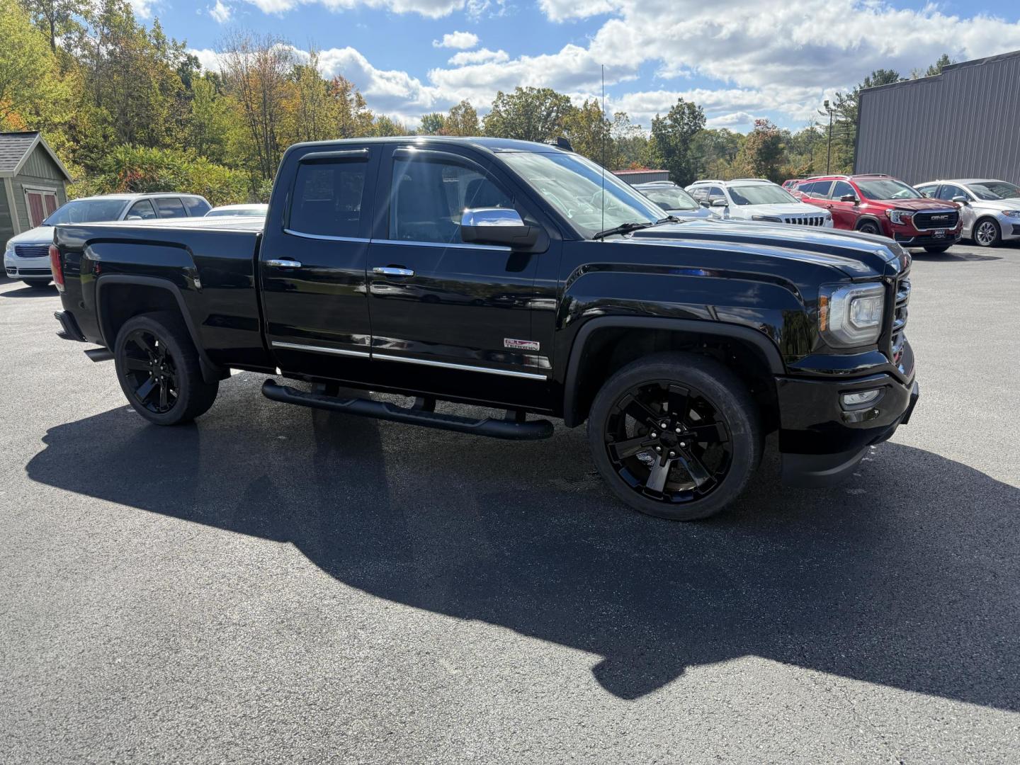 2016 Black /Black GMC Sierra 1500 SLE Double Cab 4WD (1GTV2MEC6GZ) with an 5.3L V8 OHV 16V engine, 6A transmission, located at 11115 Chardon Rd. , Chardon, OH, 44024, (440) 214-9705, 41.580246, -81.241943 - Get the perfect blend of power, capability, and comfort with this 2016 GMC Sierra 1500 SLE Double Cab All Terrain. Driven by a strong 5.3L EcoTec3 V8 engine and 6-speed automatic transmission, this truck boasts a 9,200-pound towing capacity, 3.42 gearing, and a G80 locking rear differential—ready - Photo#3