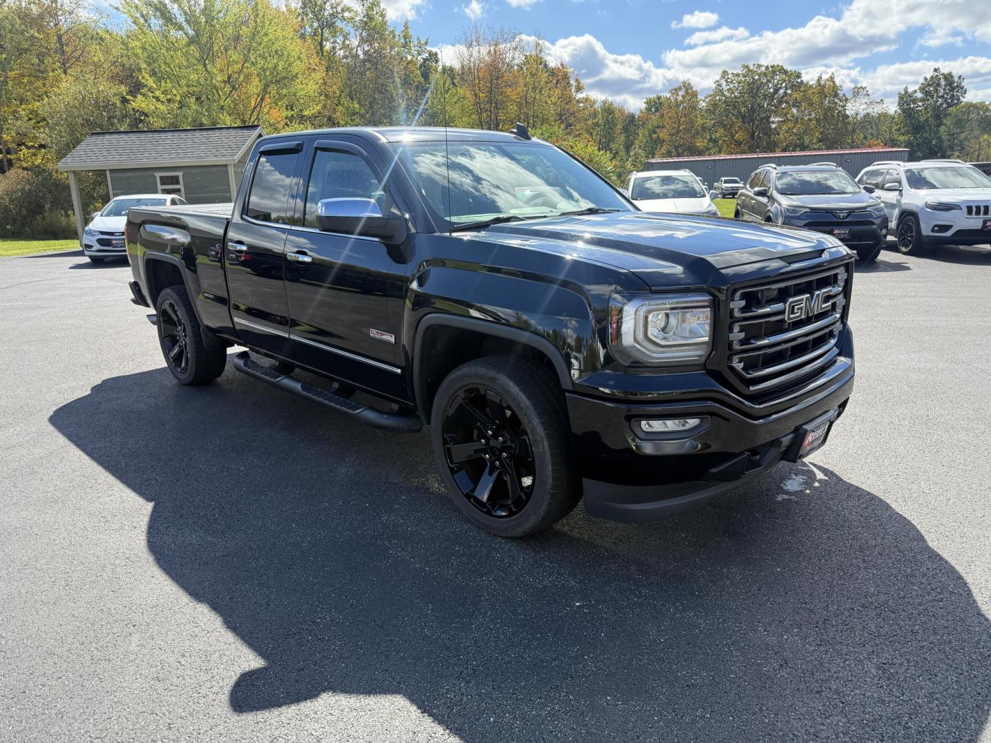 2016 Black /Black GMC Sierra 1500 SLE Double Cab 4WD (1GTV2MEC6GZ) with an 5.3L V8 OHV 16V engine, 6A transmission, located at 11115 Chardon Rd. , Chardon, OH, 44024, (440) 214-9705, 41.580246, -81.241943 - Get the perfect blend of power, capability, and comfort with this 2016 GMC Sierra 1500 SLE Double Cab All Terrain. Driven by a strong 5.3L EcoTec3 V8 engine and 6-speed automatic transmission, this truck boasts a 9,200-pound towing capacity, 3.42 gearing, and a G80 locking rear differential—ready - Photo#2