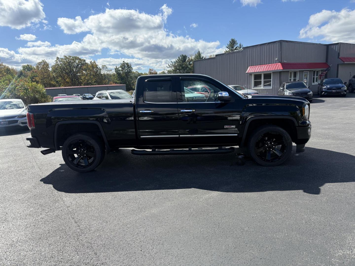 2016 Black /Black GMC Sierra 1500 SLE Double Cab 4WD (1GTV2MEC6GZ) with an 5.3L V8 OHV 16V engine, 6A transmission, located at 11115 Chardon Rd. , Chardon, OH, 44024, (440) 214-9705, 41.580246, -81.241943 - Get the perfect blend of power, capability, and comfort with this 2016 GMC Sierra 1500 SLE Double Cab All Terrain. Driven by a strong 5.3L EcoTec3 V8 engine and 6-speed automatic transmission, this truck boasts a 9,200-pound towing capacity, 3.42 gearing, and a G80 locking rear differential—ready - Photo#6