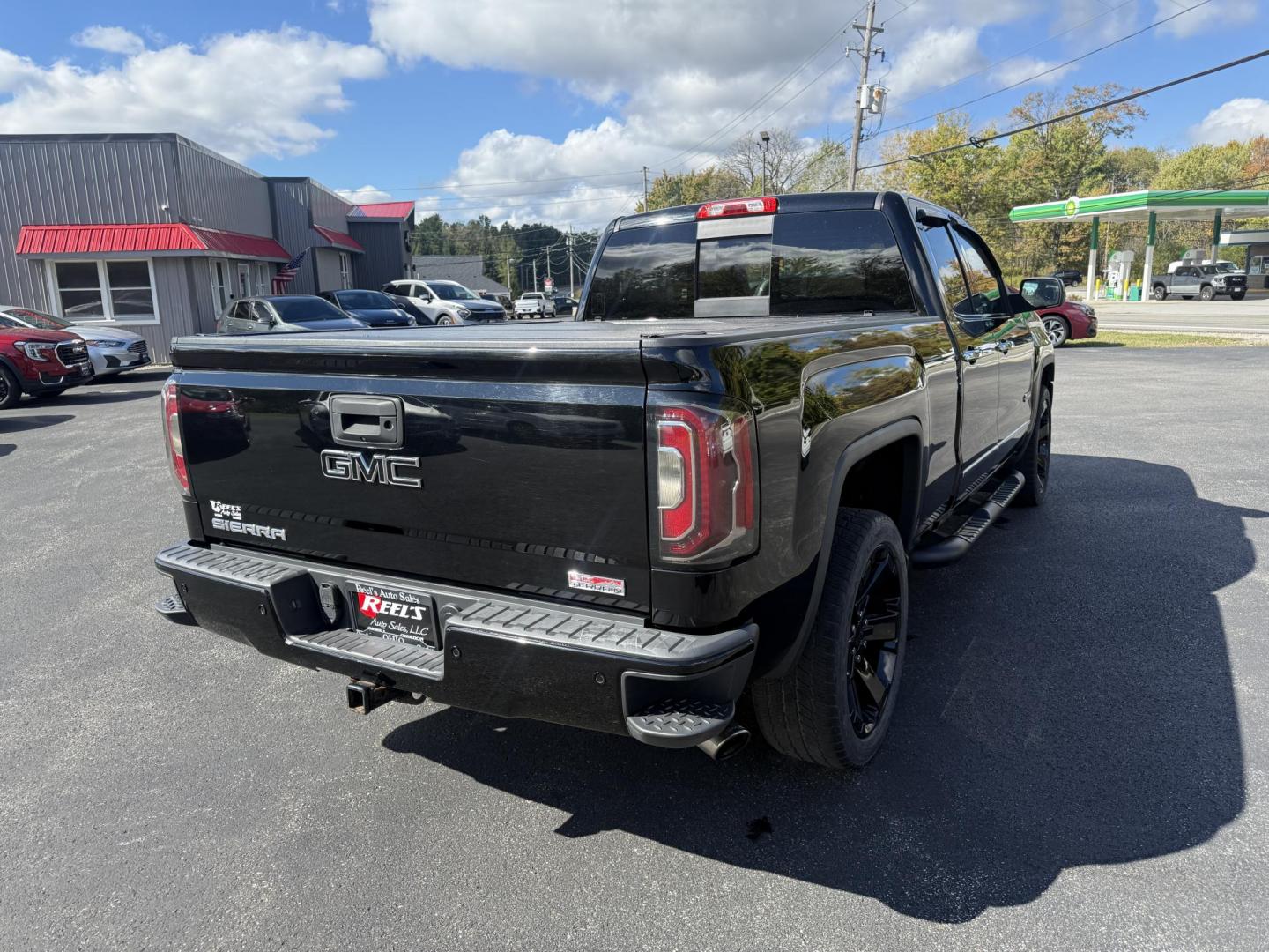 2016 Black /Black GMC Sierra 1500 SLE Double Cab 4WD (1GTV2MEC6GZ) with an 5.3L V8 OHV 16V engine, 6A transmission, located at 11115 Chardon Rd. , Chardon, OH, 44024, (440) 214-9705, 41.580246, -81.241943 - Get the perfect blend of power, capability, and comfort with this 2016 GMC Sierra 1500 SLE Double Cab All Terrain. Driven by a strong 5.3L EcoTec3 V8 engine and 6-speed automatic transmission, this truck boasts a 9,200-pound towing capacity, 3.42 gearing, and a G80 locking rear differential—ready - Photo#8