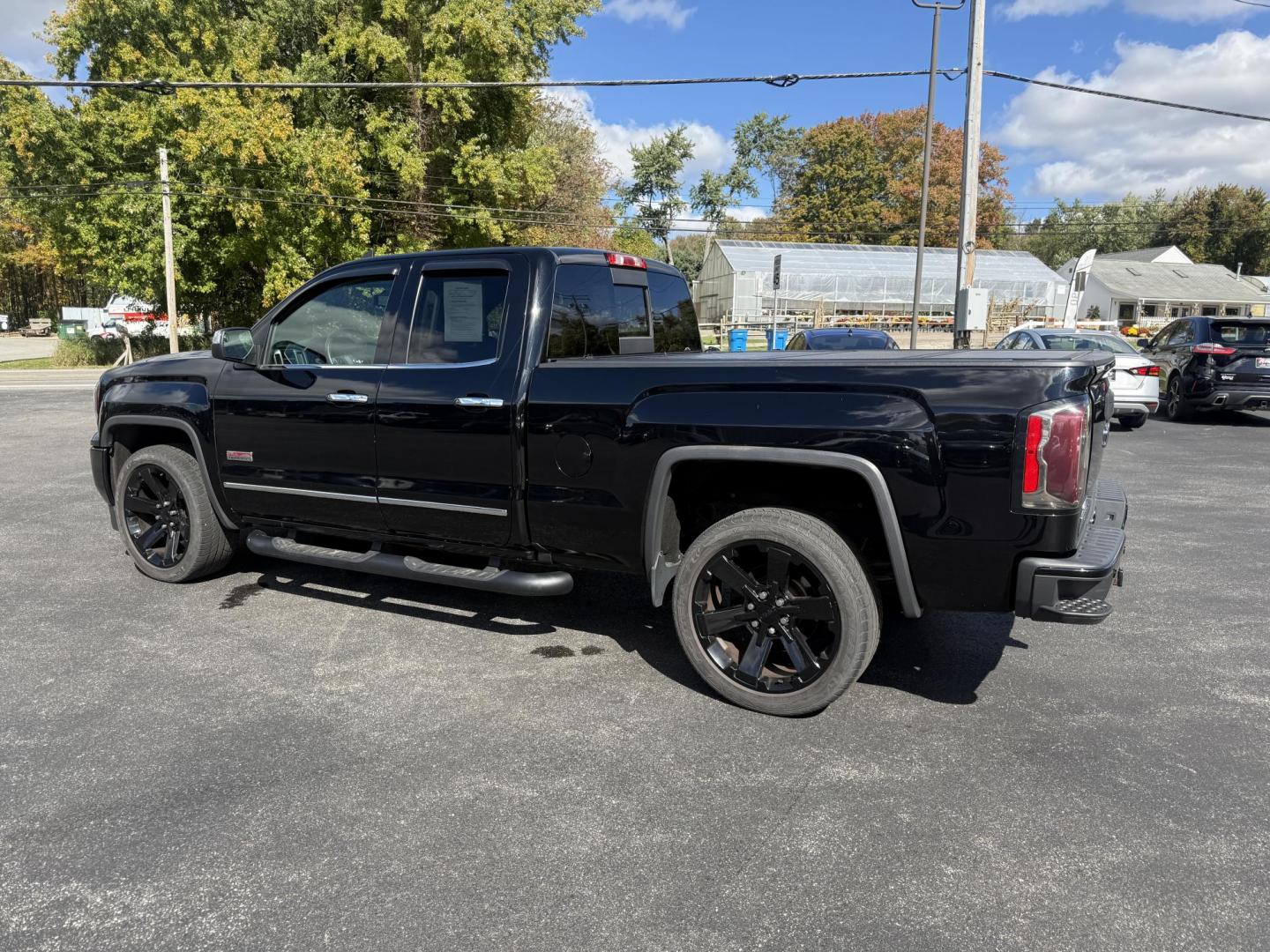 2016 Black /Black GMC Sierra 1500 SLE Double Cab 4WD (1GTV2MEC6GZ) with an 5.3L V8 OHV 16V engine, 6A transmission, located at 11115 Chardon Rd. , Chardon, OH, 44024, (440) 214-9705, 41.580246, -81.241943 - Get the perfect blend of power, capability, and comfort with this 2016 GMC Sierra 1500 SLE Double Cab All Terrain. Driven by a strong 5.3L EcoTec3 V8 engine and 6-speed automatic transmission, this truck boasts a 9,200-pound towing capacity, 3.42 gearing, and a G80 locking rear differential—ready - Photo#12