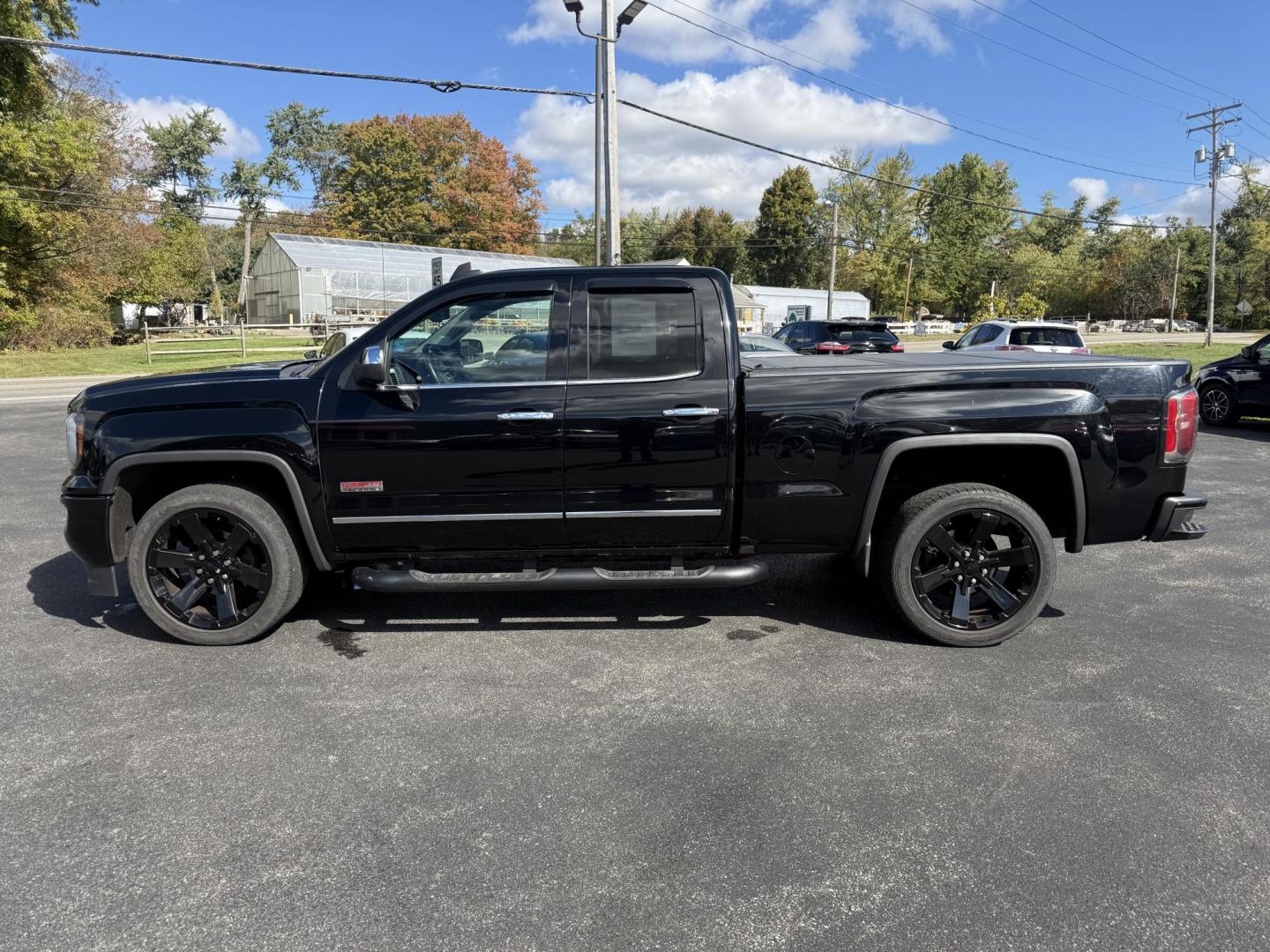 2016 Black /Black GMC Sierra 1500 SLE Double Cab 4WD (1GTV2MEC6GZ) with an 5.3L V8 OHV 16V engine, 6A transmission, located at 11115 Chardon Rd. , Chardon, OH, 44024, (440) 214-9705, 41.580246, -81.241943 - Get the perfect blend of power, capability, and comfort with this 2016 GMC Sierra 1500 SLE Double Cab All Terrain. Driven by a strong 5.3L EcoTec3 V8 engine and 6-speed automatic transmission, this truck boasts a 9,200-pound towing capacity, 3.42 gearing, and a G80 locking rear differential—ready - Photo#14