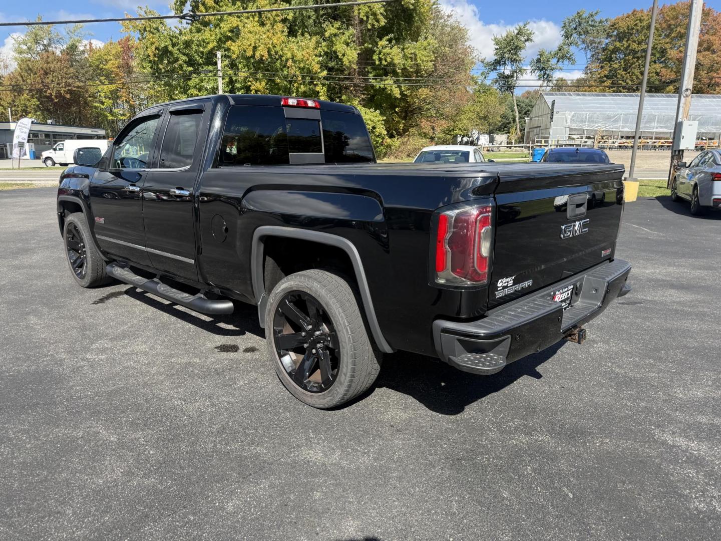 2016 Black /Black GMC Sierra 1500 SLE Double Cab 4WD (1GTV2MEC6GZ) with an 5.3L V8 OHV 16V engine, 6A transmission, located at 11115 Chardon Rd. , Chardon, OH, 44024, (440) 214-9705, 41.580246, -81.241943 - Get the perfect blend of power, capability, and comfort with this 2016 GMC Sierra 1500 SLE Double Cab All Terrain. Driven by a strong 5.3L EcoTec3 V8 engine and 6-speed automatic transmission, this truck boasts a 9,200-pound towing capacity, 3.42 gearing, and a G80 locking rear differential—ready - Photo#11