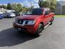 2016 Red /Gray Nissan Frontier SV Crew Cab 5AT 4WD (1N6AD0EV0GN) with an 4.0L V6 DOHC 24V engine, 5A transmission, located at 11115 Chardon Rd. , Chardon, OH, 44024, (440) 214-9705, 41.580246, -81.241943 - Tackle any job or adventure with this 2016 Nissan Frontier SV Crew Cab. Powered by a reliable 4.0L V6 engine and 5-speed automatic transmission, this truck offers a strong 6,300-pound towing capacity and is equipped with a Dana 44 rear axle for added durability. Enjoy added confidence on any terrain - Photo#0