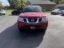 2016 Red /Gray Nissan Frontier SV Crew Cab 5AT 4WD (1N6AD0EV0GN) with an 4.0L V6 DOHC 24V engine, 5A transmission, located at 11115 Chardon Rd. , Chardon, OH, 44024, (440) 214-9705, 41.580246, -81.241943 - Tackle any job or adventure with this 2016 Nissan Frontier SV Crew Cab. Powered by a reliable 4.0L V6 engine and 5-speed automatic transmission, this truck offers a strong 6,300-pound towing capacity and is equipped with a Dana 44 rear axle for added durability. Enjoy added confidence on any terrain - Photo#1