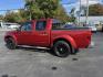 2016 Red /Gray Nissan Frontier SV Crew Cab 5AT 4WD (1N6AD0EV0GN) with an 4.0L V6 DOHC 24V engine, 5A transmission, located at 11115 Chardon Rd. , Chardon, OH, 44024, (440) 214-9705, 41.580246, -81.241943 - Tackle any job or adventure with this 2016 Nissan Frontier SV Crew Cab. Powered by a reliable 4.0L V6 engine and 5-speed automatic transmission, this truck offers a strong 6,300-pound towing capacity and is equipped with a Dana 44 rear axle for added durability. Enjoy added confidence on any terrain - Photo#12