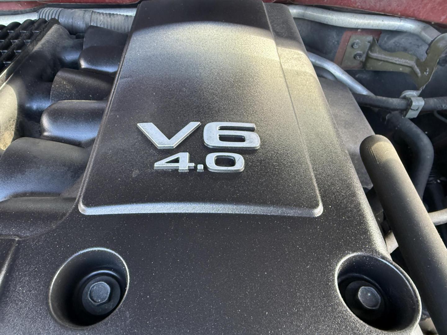 2016 Red /Gray Nissan Frontier SV Crew Cab 5AT 4WD (1N6AD0EV0GN) with an 4.0L V6 DOHC 24V engine, 5A transmission, located at 11115 Chardon Rd. , Chardon, OH, 44024, (440) 214-9705, 41.580246, -81.241943 - Tackle any job or adventure with this 2016 Nissan Frontier SV Crew Cab. Powered by a reliable 4.0L V6 engine and 5-speed automatic transmission, this truck offers a strong 6,300-pound towing capacity and is equipped with a Dana 44 rear axle for added durability. Enjoy added confidence on any terrain - Photo#17