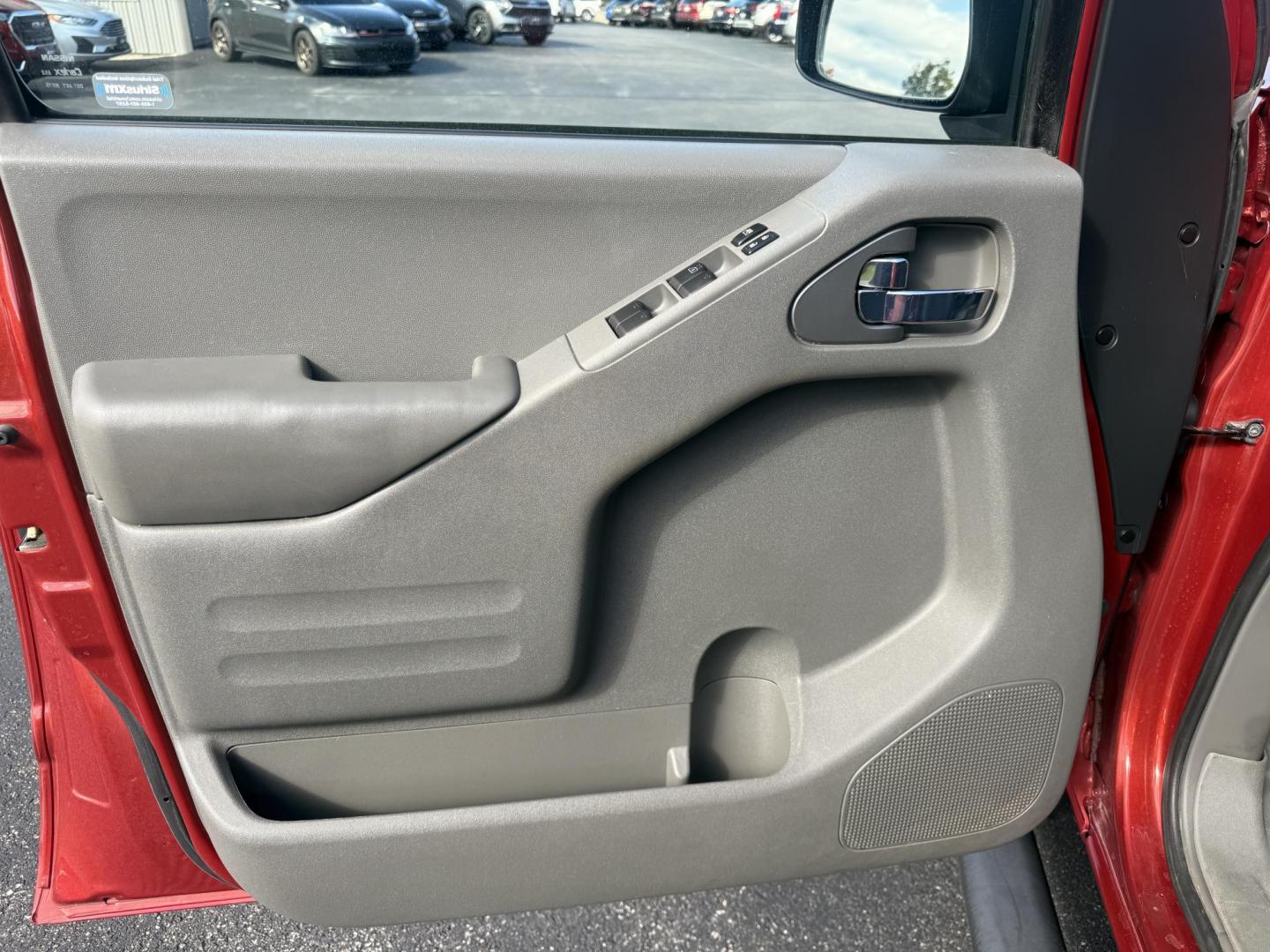 2016 Red /Gray Nissan Frontier SV Crew Cab 5AT 4WD (1N6AD0EV0GN) with an 4.0L V6 DOHC 24V engine, 5A transmission, located at 11115 Chardon Rd. , Chardon, OH, 44024, (440) 214-9705, 41.580246, -81.241943 - Tackle any job or adventure with this 2016 Nissan Frontier SV Crew Cab. Powered by a reliable 4.0L V6 engine and 5-speed automatic transmission, this truck offers a strong 6,300-pound towing capacity and is equipped with a Dana 44 rear axle for added durability. Enjoy added confidence on any terrain - Photo#19