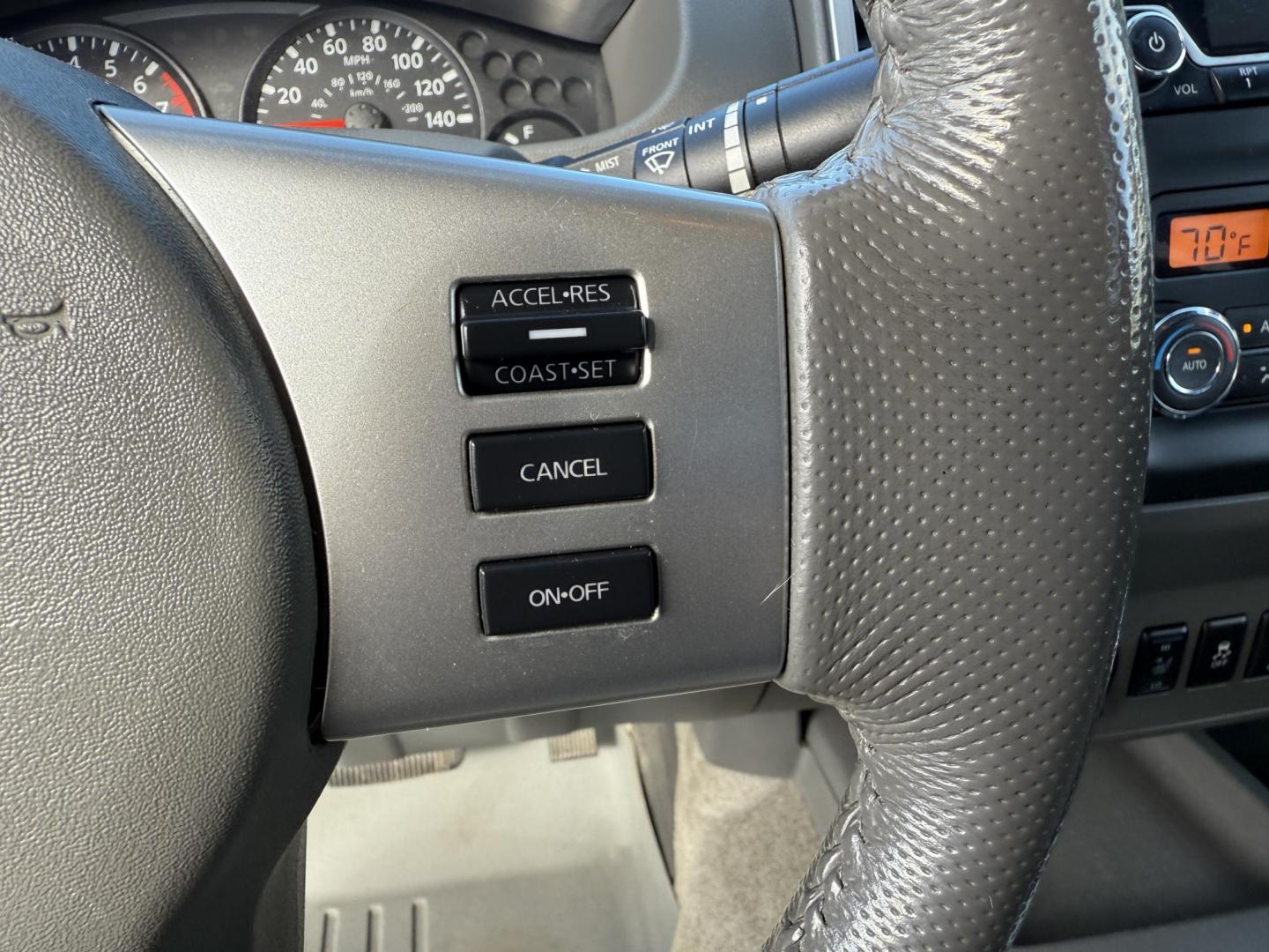 2016 Red /Gray Nissan Frontier SV Crew Cab 5AT 4WD (1N6AD0EV0GN) with an 4.0L V6 DOHC 24V engine, 5A transmission, located at 11115 Chardon Rd. , Chardon, OH, 44024, (440) 214-9705, 41.580246, -81.241943 - Tackle any job or adventure with this 2016 Nissan Frontier SV Crew Cab. Powered by a reliable 4.0L V6 engine and 5-speed automatic transmission, this truck offers a strong 6,300-pound towing capacity and is equipped with a Dana 44 rear axle for added durability. Enjoy added confidence on any terrain - Photo#27