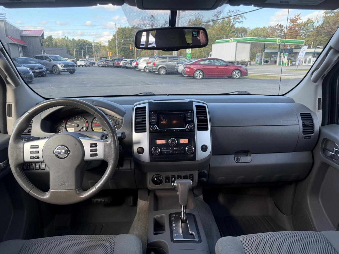 2016 Red /Gray Nissan Frontier SV Crew Cab 5AT 4WD (1N6AD0EV0GN) with an 4.0L V6 DOHC 24V engine, 5A transmission, located at 11115 Chardon Rd. , Chardon, OH, 44024, (440) 214-9705, 41.580246, -81.241943 - Tackle any job or adventure with this 2016 Nissan Frontier SV Crew Cab. Powered by a reliable 4.0L V6 engine and 5-speed automatic transmission, this truck offers a strong 6,300-pound towing capacity and is equipped with a Dana 44 rear axle for added durability. Enjoy added confidence on any terrain - Photo#39