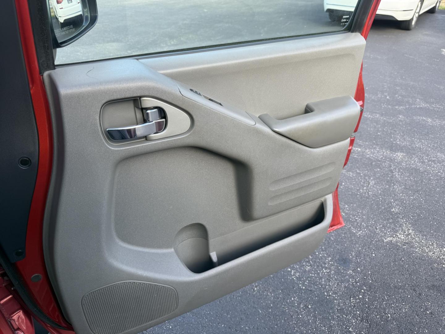 2016 Red /Gray Nissan Frontier SV Crew Cab 5AT 4WD (1N6AD0EV0GN) with an 4.0L V6 DOHC 24V engine, 5A transmission, located at 11115 Chardon Rd. , Chardon, OH, 44024, (440) 214-9705, 41.580246, -81.241943 - Tackle any job or adventure with this 2016 Nissan Frontier SV Crew Cab. Powered by a reliable 4.0L V6 engine and 5-speed automatic transmission, this truck offers a strong 6,300-pound towing capacity and is equipped with a Dana 44 rear axle for added durability. Enjoy added confidence on any terrain - Photo#46