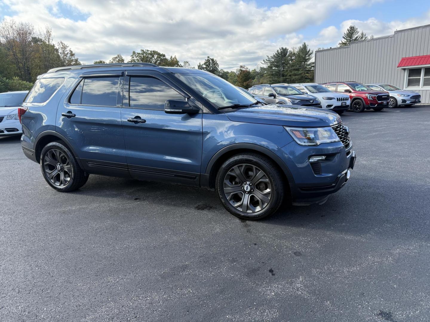2018 Blue /Black Ford Explorer Sport 4WD (1FM5K8GT4JG) with an 3.5L V6 DOHC 24V TWIN TURBO engine, 6A transmission, located at 11115 Chardon Rd. , Chardon, OH, 44024, (440) 214-9705, 41.580246, -81.241943 - Experience thrilling performance and refined comfort in this 2018 Ford Explorer Sport 4WD. Powered by a 3.5L Twin Turbo EcoBoost V6 and a 6-speed automatic transmission, this SUV accelerates from 0 to 60 in just six seconds and offers a 5,000-pound towing capacity—perfect for adventure or family g - Photo#3