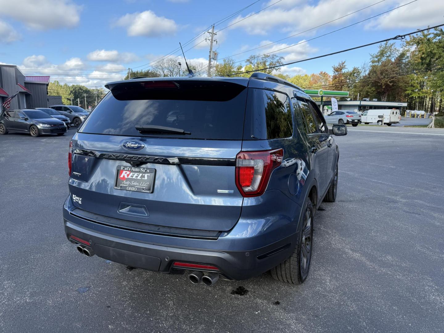 2018 Blue /Black Ford Explorer Sport 4WD (1FM5K8GT4JG) with an 3.5L V6 DOHC 24V TWIN TURBO engine, 6A transmission, located at 11115 Chardon Rd. , Chardon, OH, 44024, (440) 214-9705, 41.580246, -81.241943 - Experience thrilling performance and refined comfort in this 2018 Ford Explorer Sport 4WD. Powered by a 3.5L Twin Turbo EcoBoost V6 and a 6-speed automatic transmission, this SUV accelerates from 0 to 60 in just six seconds and offers a 5,000-pound towing capacity—perfect for adventure or family g - Photo#7