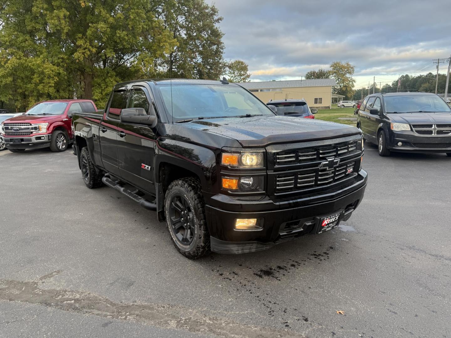 2015 Black /Black Chevrolet Silverado 1500 LT Z71 Double Cab 4WD (1GCVKREC5FZ) with an 5.3L V8 OHV 16V engine, 6-Speed Automatic transmission, located at 547 E. Main St., Orwell, OH, 44076, (440) 437-5893, 41.535435, -80.847855 - Tackle any road or job with this 2015 Chevrolet Silverado 1500 LT Z71 Double Cab 4WD. Powered by a capable 5.3L EcoTec3 V8 engine paired with a 6-speed automatic transmission and 3.42 gearing, this truck offers a robust 9,200-pound towing capacity. The Z71 Off Road Package and G80 locking rear diffe - Photo#3