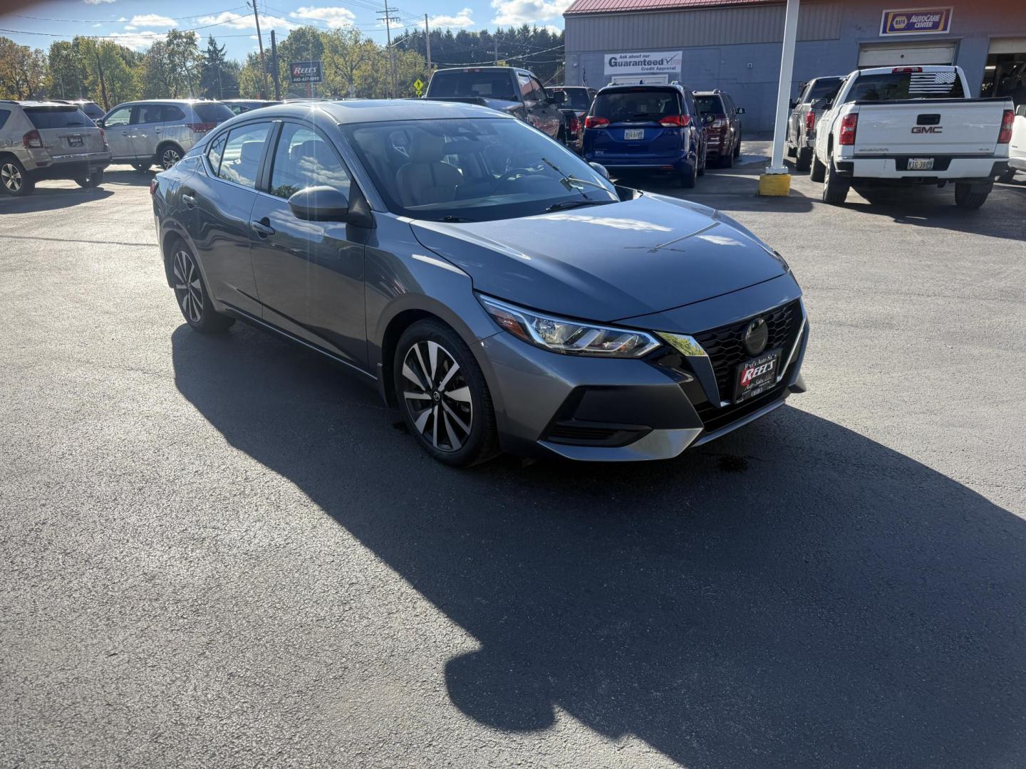 2022 Gray /Brown Nissan Sentra SV (3N1AB8CV3NY) with an 1.8L I4 SFI DOHC 16V engine, Automatic transmission, located at 547 E. Main St., Orwell, OH, 44076, (440) 437-5893, 41.535435, -80.847855 - Upgrade your daily drive with this 2022 Nissan Sentra SV, featuring the desirable SV Premium Package. Enjoy impressive efficiency with a 2.0L I4 engine delivering up to 39 MPG on the highway and 33 MPG combined. The refined interior boasts leather seating, a power driver’s seat, heated front seats - Photo#2