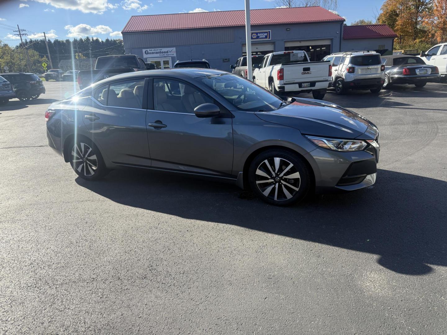 2022 Gray /Brown Nissan Sentra SV (3N1AB8CV3NY) with an 1.8L I4 SFI DOHC 16V engine, Automatic transmission, located at 547 E. Main St., Orwell, OH, 44076, (440) 437-5893, 41.535435, -80.847855 - Upgrade your daily drive with this 2022 Nissan Sentra SV, featuring the desirable SV Premium Package. Enjoy impressive efficiency with a 2.0L I4 engine delivering up to 39 MPG on the highway and 33 MPG combined. The refined interior boasts leather seating, a power driver’s seat, heated front seats - Photo#3