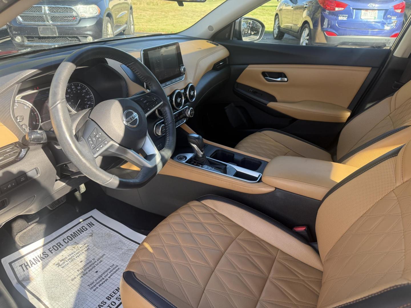 2022 Gray /Brown Nissan Sentra SV (3N1AB8CV3NY) with an 1.8L I4 SFI DOHC 16V engine, Automatic transmission, located at 547 E. Main St., Orwell, OH, 44076, (440) 437-5893, 41.535435, -80.847855 - Upgrade your daily drive with this 2022 Nissan Sentra SV, featuring the desirable SV Premium Package. Enjoy impressive efficiency with a 2.0L I4 engine delivering up to 39 MPG on the highway and 33 MPG combined. The refined interior boasts leather seating, a power driver’s seat, heated front seats - Photo#15