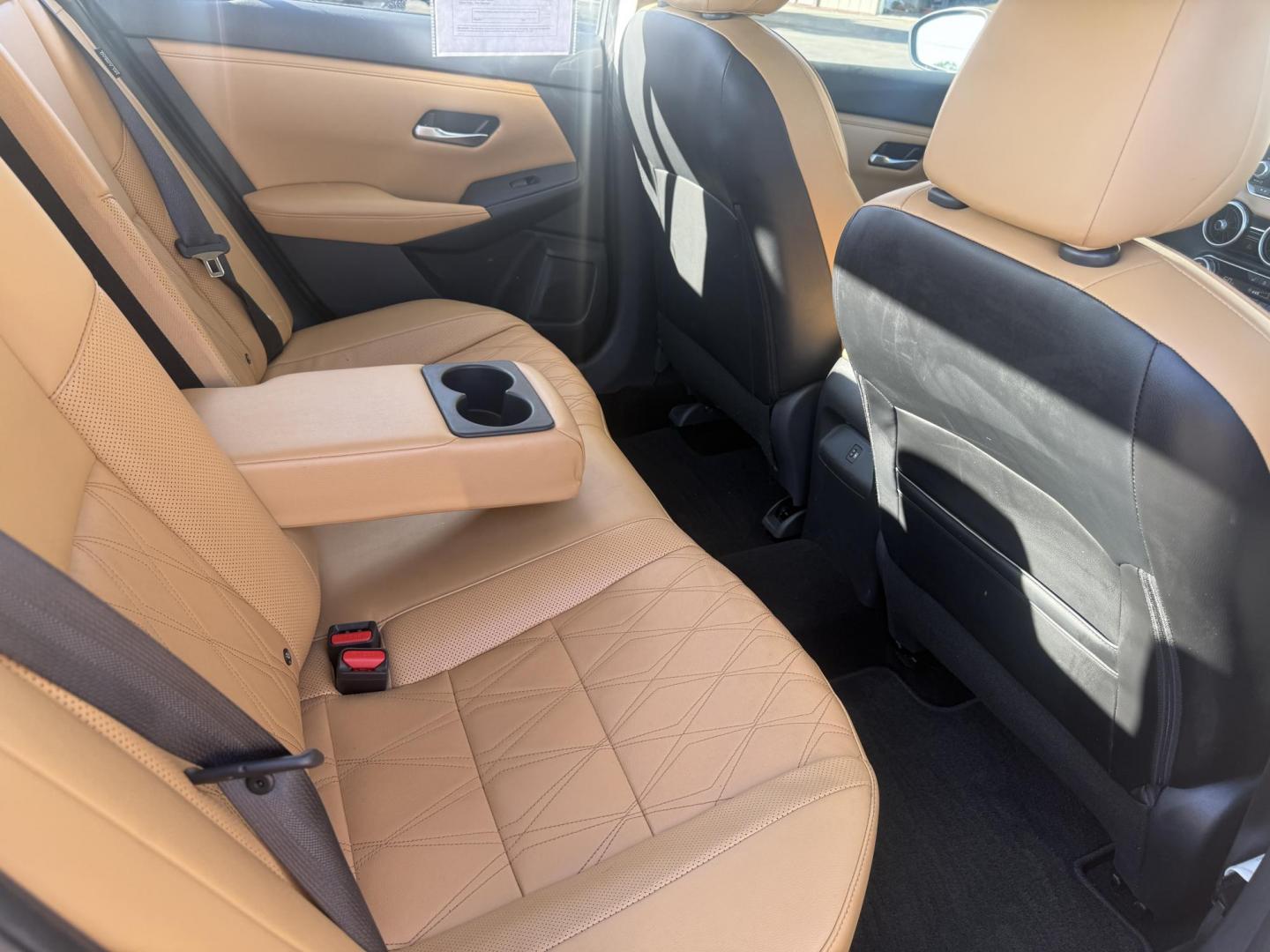 2022 Gray /Brown Nissan Sentra SV (3N1AB8CV3NY) with an 1.8L I4 SFI DOHC 16V engine, Automatic transmission, located at 547 E. Main St., Orwell, OH, 44076, (440) 437-5893, 41.535435, -80.847855 - Upgrade your daily drive with this 2022 Nissan Sentra SV, featuring the desirable SV Premium Package. Enjoy impressive efficiency with a 2.0L I4 engine delivering up to 39 MPG on the highway and 33 MPG combined. The refined interior boasts leather seating, a power driver’s seat, heated front seats - Photo#40