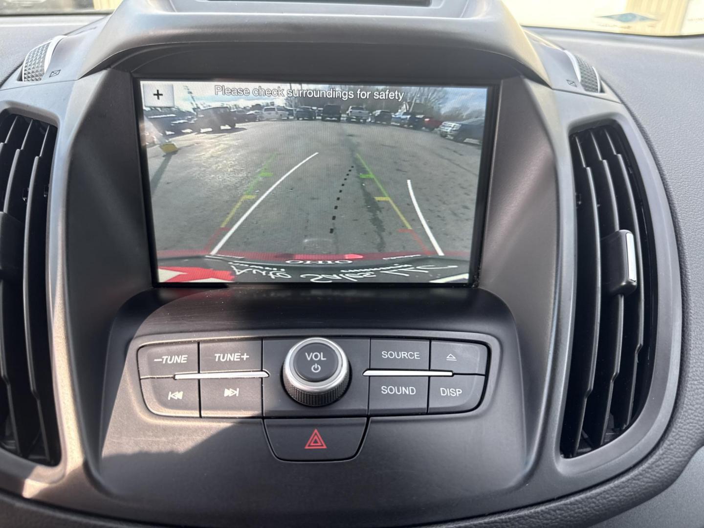 2018 Red /Black Ford Escape SE 4WD (1FMCU9GD5JU) with an 1.5L I4 DOHC 16V TURBO engine, Automatic transmission, located at 547 E. Main St., Orwell, OH, 44076, (440) 437-5893, 41.535435, -80.847855 - This 2018 Ford Escape SE 4WD is ready to roll with style, efficiency, and all the modern must-haves – your perfect everyday adventure machine! Powered by a peppy 1.5L I4 Turbocharged EcoBoost engine delivering smooth, responsive power through a slick 6-speed automatic transmission and confident 4 - Photo#15