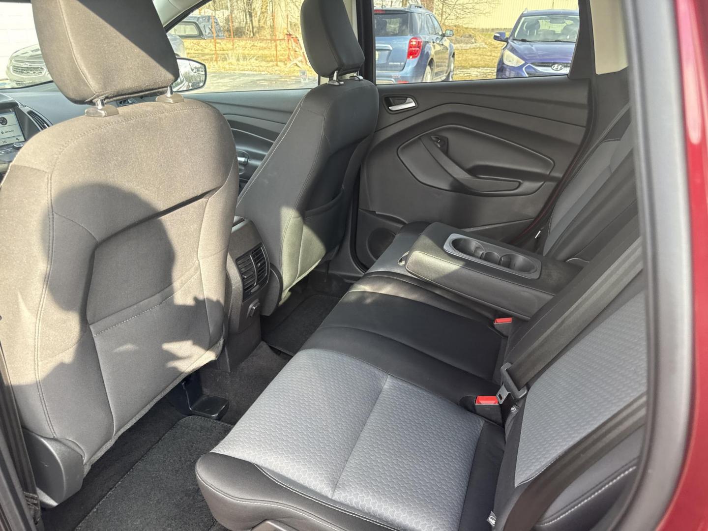 2018 Red /Black Ford Escape SE 4WD (1FMCU9GD5JU) with an 1.5L I4 DOHC 16V TURBO engine, Automatic transmission, located at 547 E. Main St., Orwell, OH, 44076, (440) 437-5893, 41.535435, -80.847855 - This 2018 Ford Escape SE 4WD is ready to roll with style, efficiency, and all the modern must-haves – your perfect everyday adventure machine! Powered by a peppy 1.5L I4 Turbocharged EcoBoost engine delivering smooth, responsive power through a slick 6-speed automatic transmission and confident 4 - Photo#18