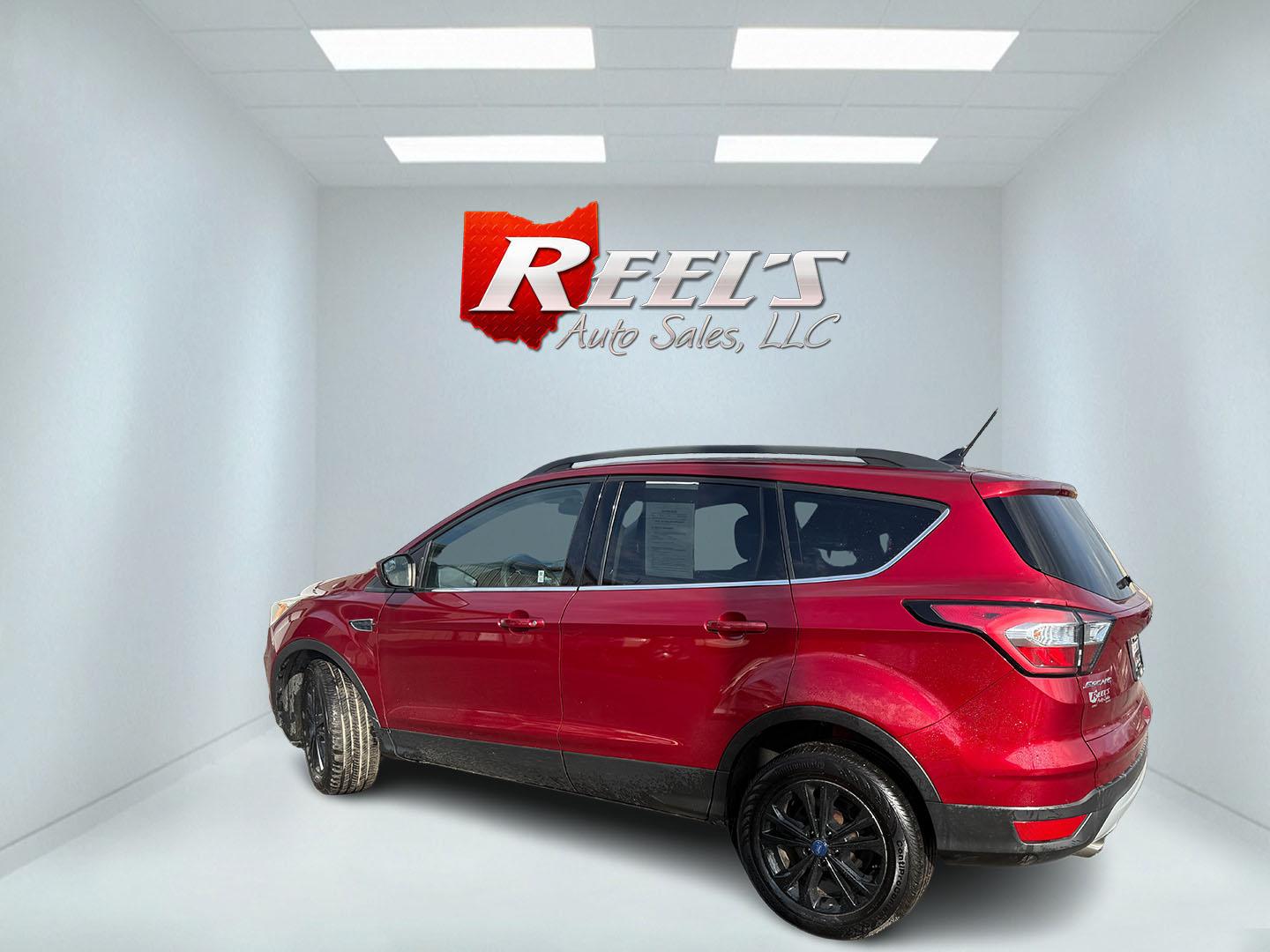 2018 Red /Black Ford Escape SE 4WD (1FMCU9GD5JU) with an 1.5L I4 DOHC 16V TURBO engine, Automatic transmission, located at 547 E. Main St., Orwell, OH, 44076, (440) 437-5893, 41.535435, -80.847855 - This 2018 Ford Escape SE 4WD is ready to roll with style, efficiency, and all the modern must-haves – your perfect everyday adventure machine! Powered by a peppy 1.5L I4 Turbocharged EcoBoost engine delivering smooth, responsive power through a slick 6-speed automatic transmission and confident 4 - Photo#28