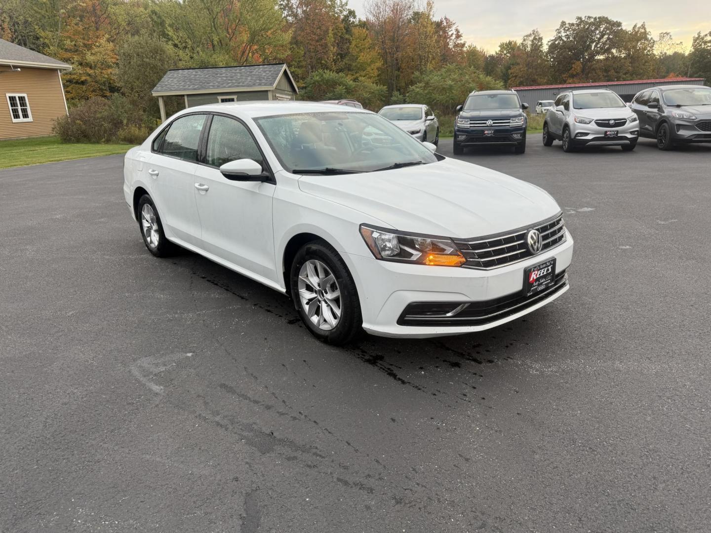 2018 White /Black Volkswagen Passat S (1VWAA7A3XJC) with an 2.0L I4 DOHC 16V Turbo engine, 6A transmission, located at 11115 Chardon Rd. , Chardon, OH, 44024, (440) 214-9705, 41.580246, -81.241943 - Experience comfort and efficiency in this 2018 Volkswagen Passat S. Equipped with a turbocharged 2.0L TSI engine and 6-speed automatic transmission, this sedan delivers a smooth ride and outstanding fuel economy—up to 36 MPG on the highway. Enjoy peace of mind with advanced safety features like bl - Photo#2