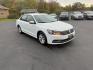 2018 White /Black Volkswagen Passat S (1VWAA7A3XJC) with an 2.0L I4 DOHC 16V Turbo engine, 6A transmission, located at 11115 Chardon Rd. , Chardon, OH, 44024, (440) 214-9705, 41.580246, -81.241943 - Experience comfort and efficiency in this 2018 Volkswagen Passat S. Equipped with a turbocharged 2.0L TSI engine and 6-speed automatic transmission, this sedan delivers a smooth ride and outstanding fuel economy—up to 36 MPG on the highway. Enjoy peace of mind with advanced safety features like bl - Photo#2