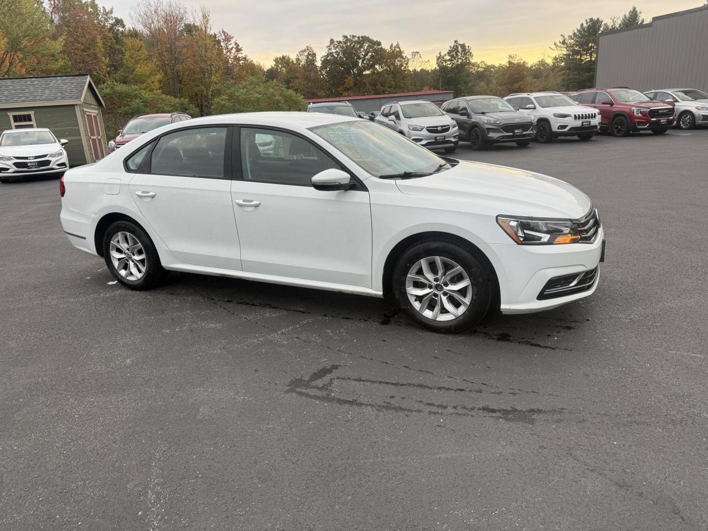 2018 White /Black Volkswagen Passat S (1VWAA7A3XJC) with an 2.0L I4 DOHC 16V Turbo engine, 6A transmission, located at 11115 Chardon Rd. , Chardon, OH, 44024, (440) 214-9705, 41.580246, -81.241943 - Experience comfort and efficiency in this 2018 Volkswagen Passat S. Equipped with a turbocharged 2.0L TSI engine and 6-speed automatic transmission, this sedan delivers a smooth ride and outstanding fuel economy—up to 36 MPG on the highway. Enjoy peace of mind with advanced safety features like bl - Photo#3
