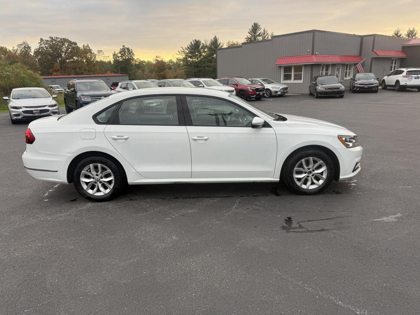 2018 White /Black Volkswagen Passat S (1VWAA7A3XJC) with an 2.0L I4 DOHC 16V Turbo engine, 6A transmission, located at 11115 Chardon Rd. , Chardon, OH, 44024, (440) 214-9705, 41.580246, -81.241943 - Experience comfort and efficiency in this 2018 Volkswagen Passat S. Equipped with a turbocharged 2.0L TSI engine and 6-speed automatic transmission, this sedan delivers a smooth ride and outstanding fuel economy—up to 36 MPG on the highway. Enjoy peace of mind with advanced safety features like bl - Photo#5