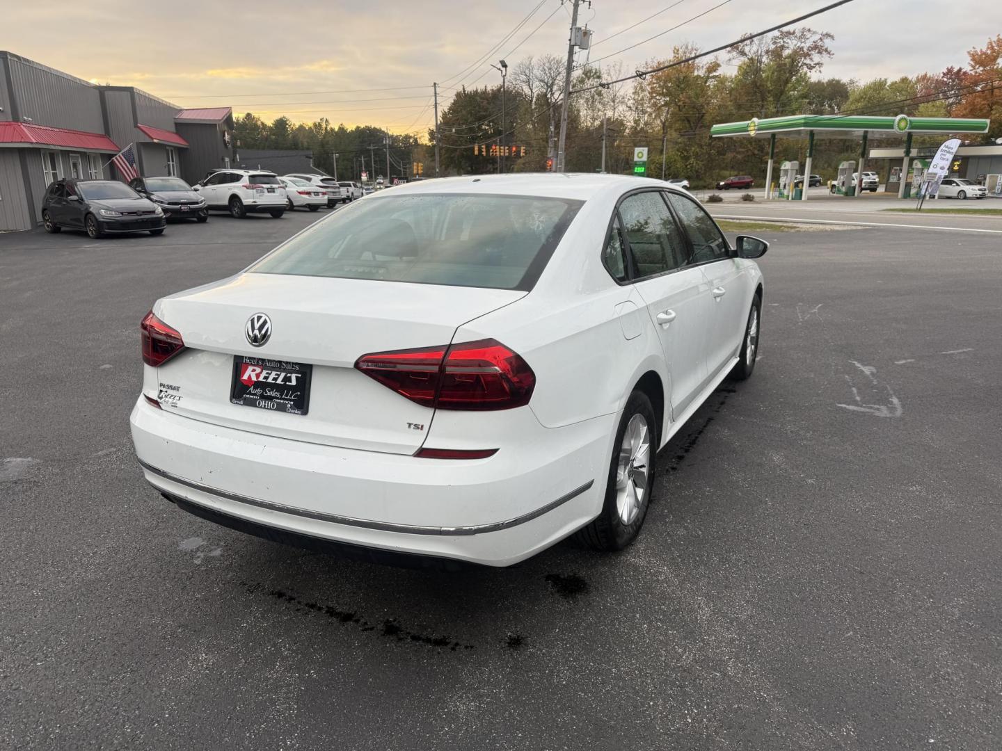 2018 White /Black Volkswagen Passat S (1VWAA7A3XJC) with an 2.0L I4 DOHC 16V Turbo engine, 6A transmission, located at 11115 Chardon Rd. , Chardon, OH, 44024, (440) 214-9705, 41.580246, -81.241943 - Experience comfort and efficiency in this 2018 Volkswagen Passat S. Equipped with a turbocharged 2.0L TSI engine and 6-speed automatic transmission, this sedan delivers a smooth ride and outstanding fuel economy—up to 36 MPG on the highway. Enjoy peace of mind with advanced safety features like bl - Photo#7