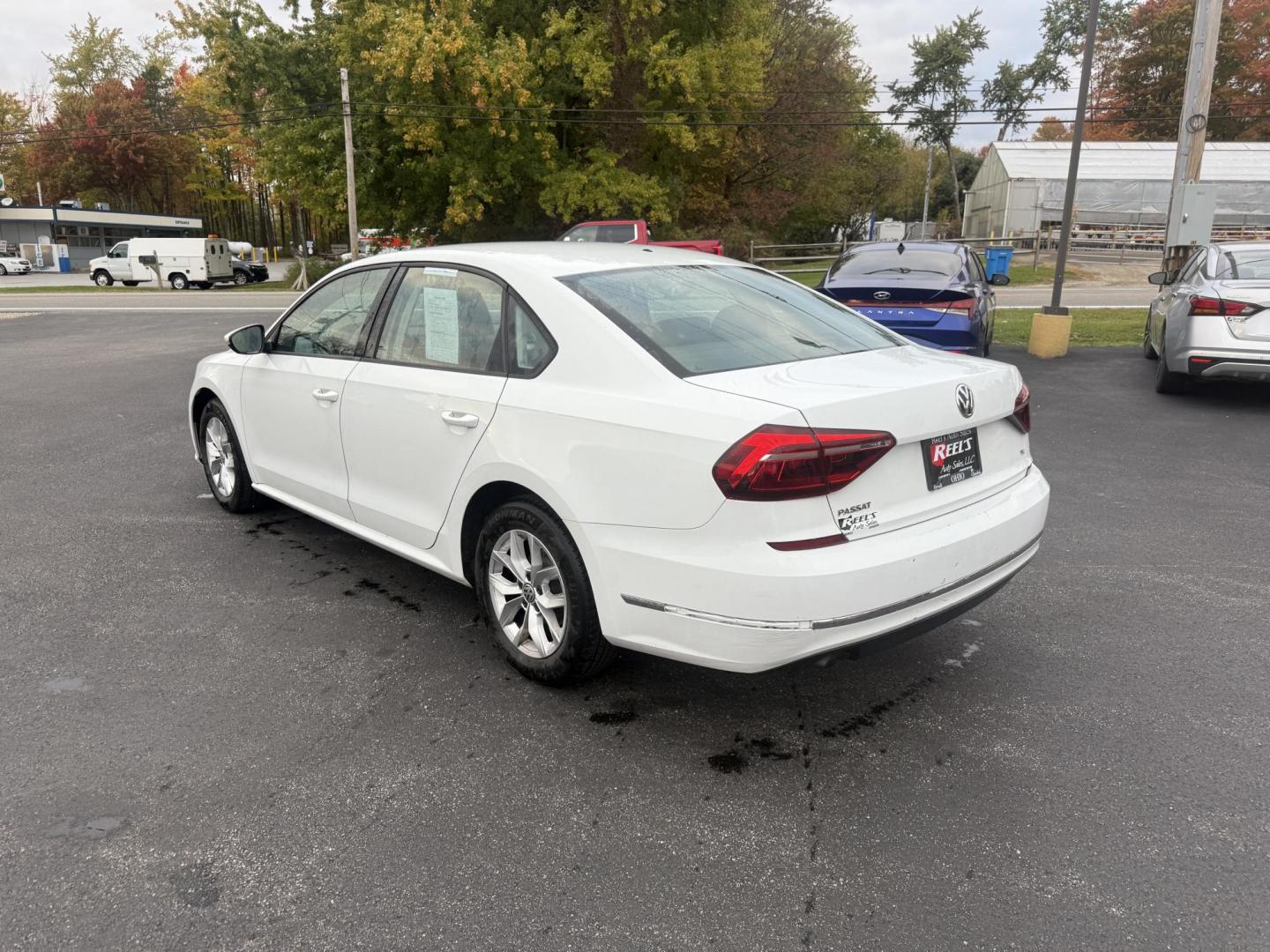 2018 White /Black Volkswagen Passat S (1VWAA7A3XJC) with an 2.0L I4 DOHC 16V Turbo engine, 6A transmission, located at 11115 Chardon Rd. , Chardon, OH, 44024, (440) 214-9705, 41.580246, -81.241943 - Experience comfort and efficiency in this 2018 Volkswagen Passat S. Equipped with a turbocharged 2.0L TSI engine and 6-speed automatic transmission, this sedan delivers a smooth ride and outstanding fuel economy—up to 36 MPG on the highway. Enjoy peace of mind with advanced safety features like bl - Photo#9