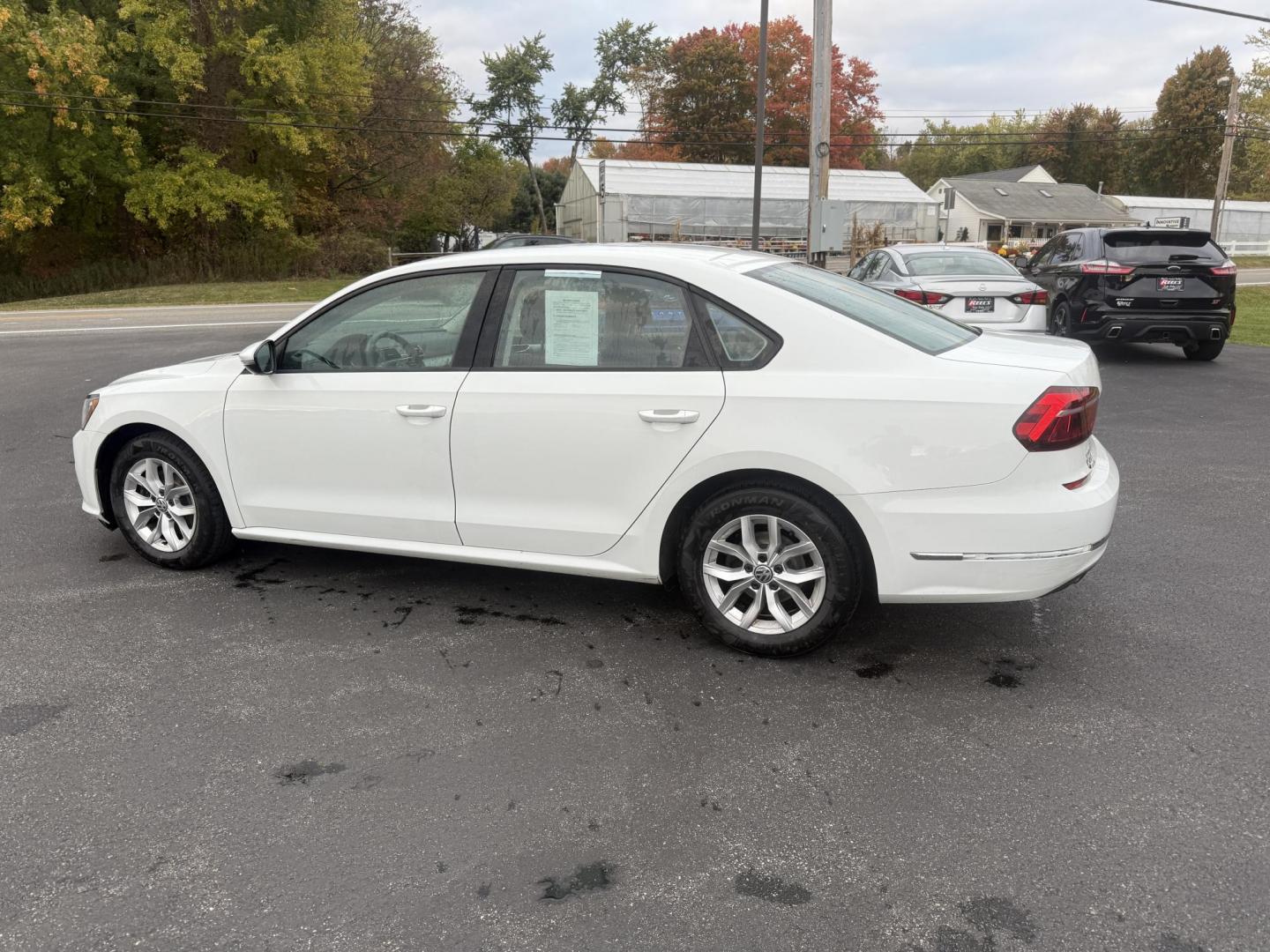 2018 White /Black Volkswagen Passat S (1VWAA7A3XJC) with an 2.0L I4 DOHC 16V Turbo engine, 6A transmission, located at 11115 Chardon Rd. , Chardon, OH, 44024, (440) 214-9705, 41.580246, -81.241943 - Experience comfort and efficiency in this 2018 Volkswagen Passat S. Equipped with a turbocharged 2.0L TSI engine and 6-speed automatic transmission, this sedan delivers a smooth ride and outstanding fuel economy—up to 36 MPG on the highway. Enjoy peace of mind with advanced safety features like bl - Photo#10