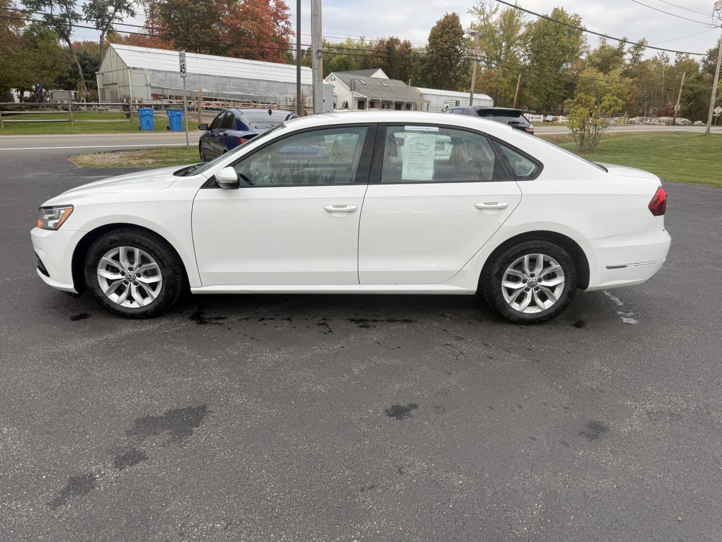 2018 White /Black Volkswagen Passat S (1VWAA7A3XJC) with an 2.0L I4 DOHC 16V Turbo engine, 6A transmission, located at 11115 Chardon Rd. , Chardon, OH, 44024, (440) 214-9705, 41.580246, -81.241943 - Experience comfort and efficiency in this 2018 Volkswagen Passat S. Equipped with a turbocharged 2.0L TSI engine and 6-speed automatic transmission, this sedan delivers a smooth ride and outstanding fuel economy—up to 36 MPG on the highway. Enjoy peace of mind with advanced safety features like bl - Photo#12