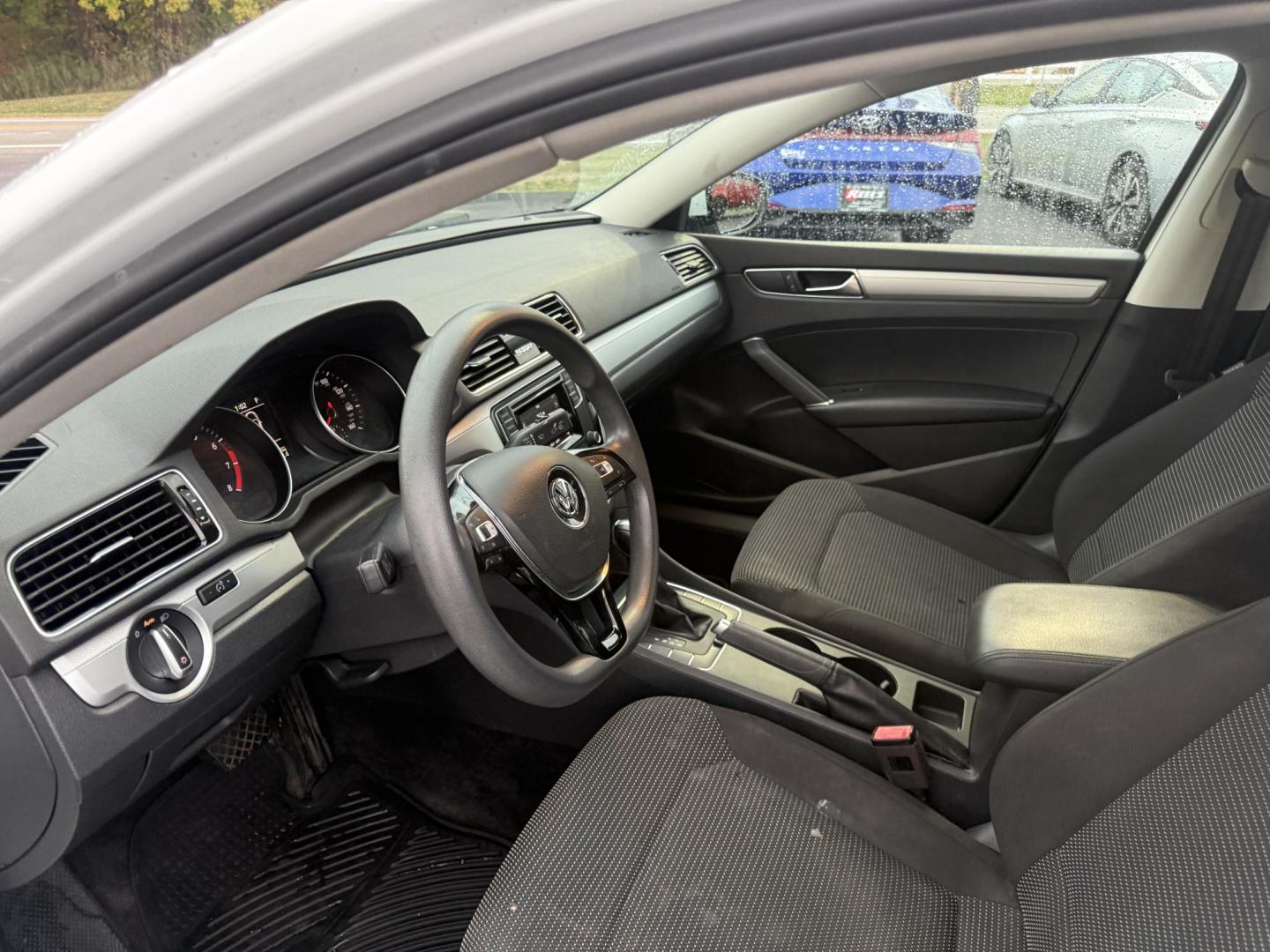 2018 White /Black Volkswagen Passat S (1VWAA7A3XJC) with an 2.0L I4 DOHC 16V Turbo engine, 6A transmission, located at 11115 Chardon Rd. , Chardon, OH, 44024, (440) 214-9705, 41.580246, -81.241943 - Experience comfort and efficiency in this 2018 Volkswagen Passat S. Equipped with a turbocharged 2.0L TSI engine and 6-speed automatic transmission, this sedan delivers a smooth ride and outstanding fuel economy—up to 36 MPG on the highway. Enjoy peace of mind with advanced safety features like bl - Photo#15