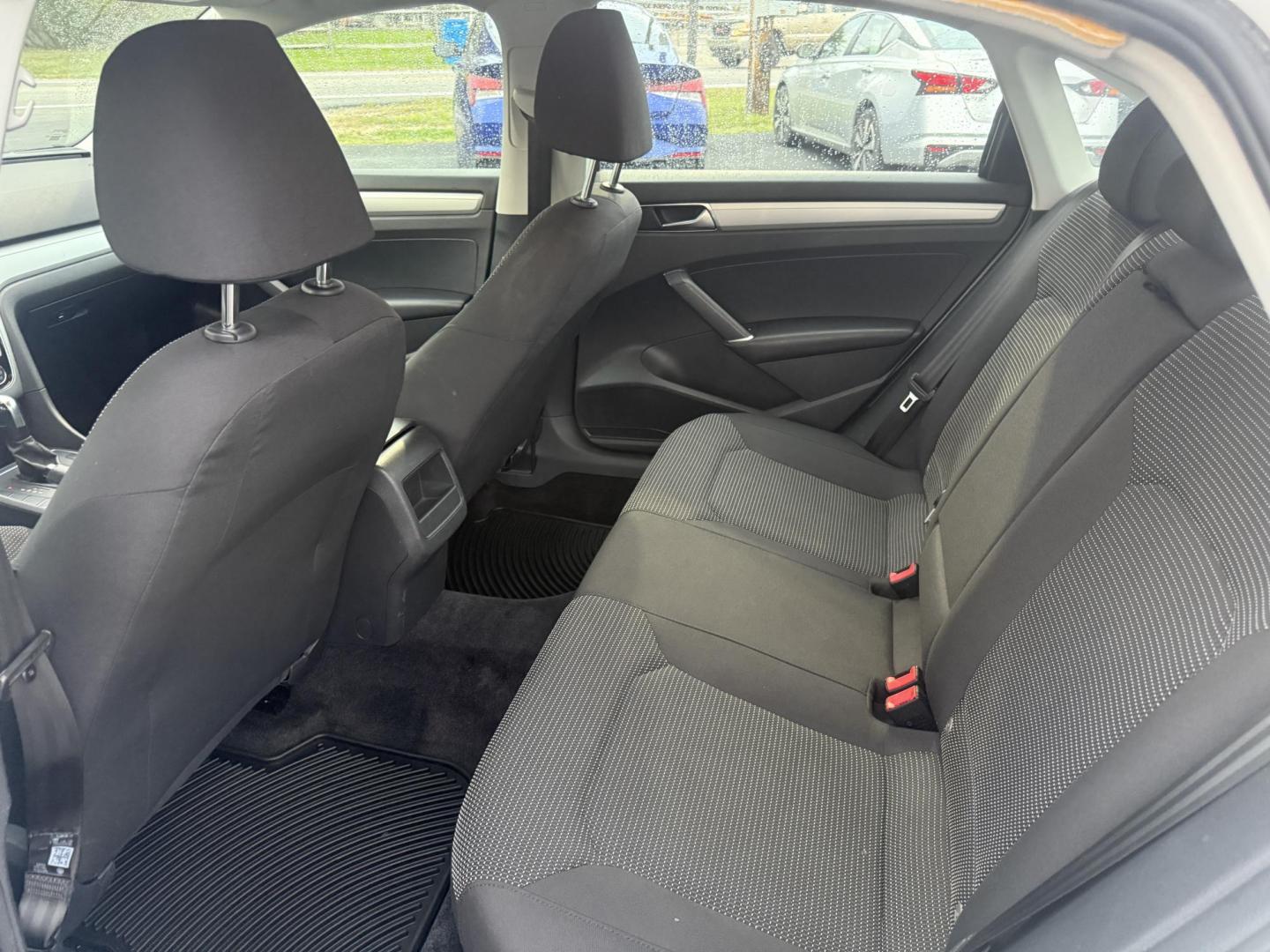 2018 White /Black Volkswagen Passat S (1VWAA7A3XJC) with an 2.0L I4 DOHC 16V Turbo engine, 6A transmission, located at 11115 Chardon Rd. , Chardon, OH, 44024, (440) 214-9705, 41.580246, -81.241943 - Experience comfort and efficiency in this 2018 Volkswagen Passat S. Equipped with a turbocharged 2.0L TSI engine and 6-speed automatic transmission, this sedan delivers a smooth ride and outstanding fuel economy—up to 36 MPG on the highway. Enjoy peace of mind with advanced safety features like bl - Photo#32